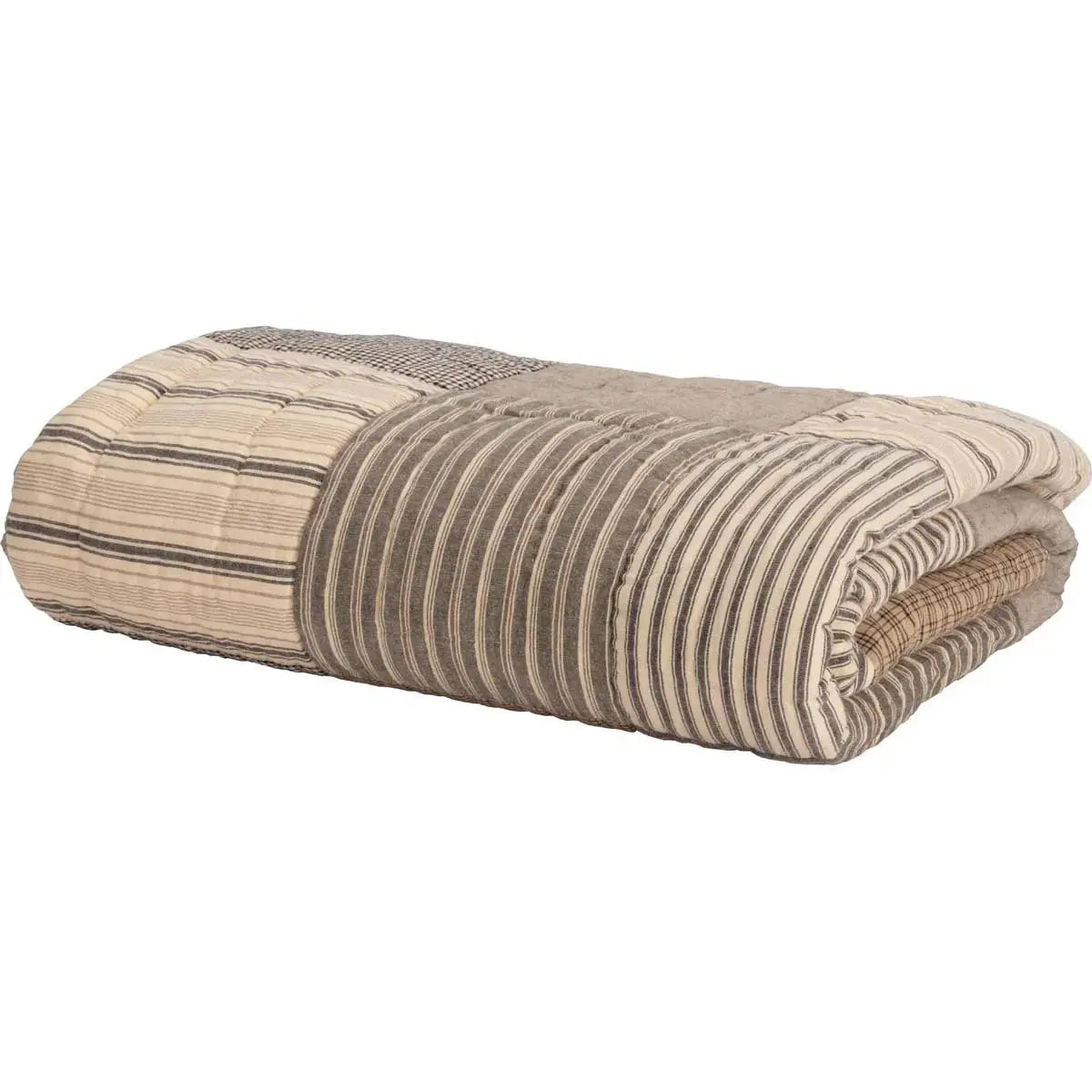 Cozy farmhouse quilt with striped patchwork design, perfect for cottage style home decor