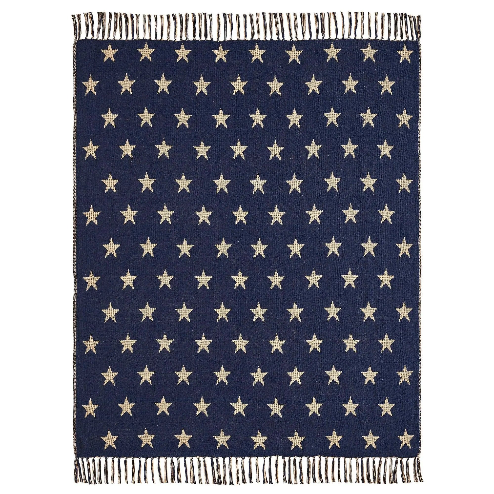 Navy blue blanket with beige star pattern on a white background