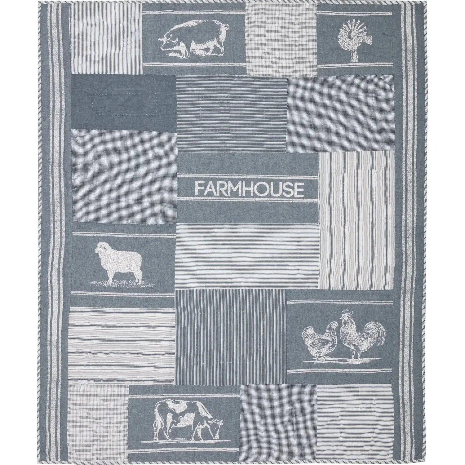 Patchwork towel with farm animal illustrations on a white background