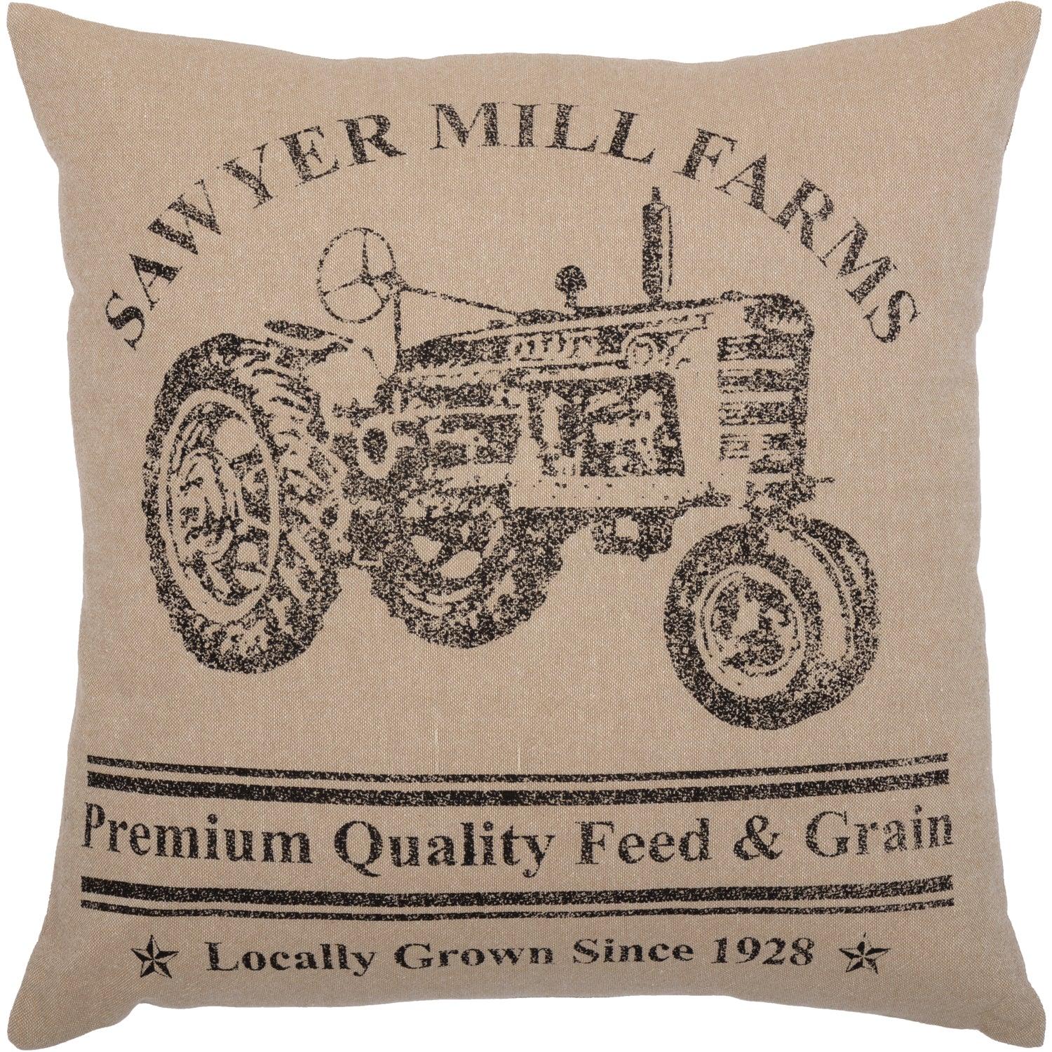 Pillow with a tractor design and 'Sawyer Mill Farms' text on a beige background