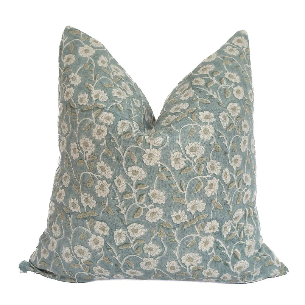 Floral patterned pillow on a white background