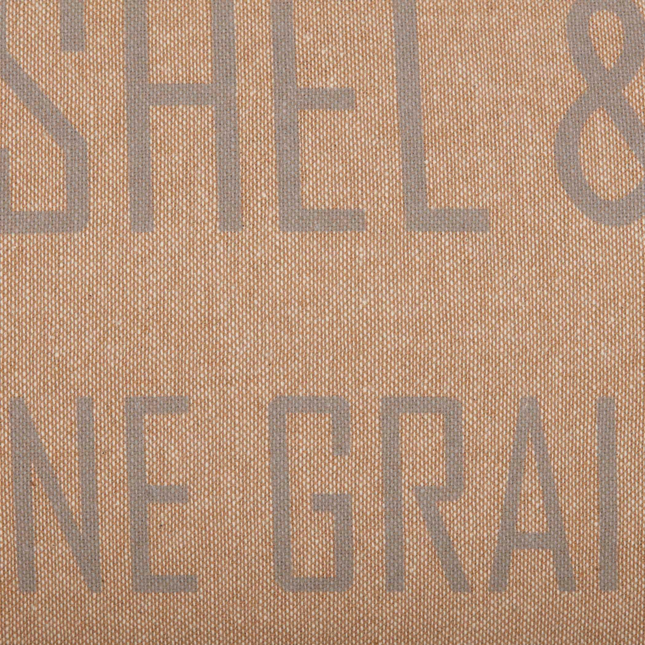Textured fabric with 'SHEL' and 'NEGRA' printed in gray, ideal for farmhouse decor accents.