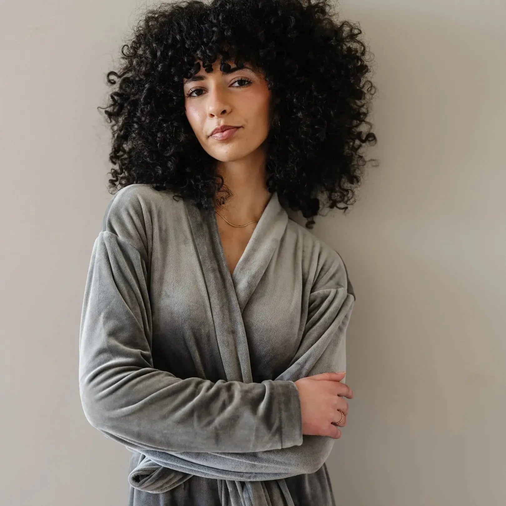 Woman in cozy gray velvet robe, perfect for farmhouse cottage home decor and bath essentials