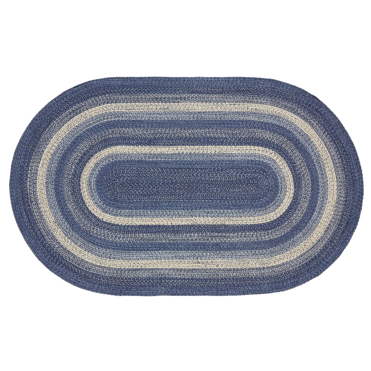 An oval braided rug with concentric stripes in shades of blue and cream, shown flat against a solid white background.