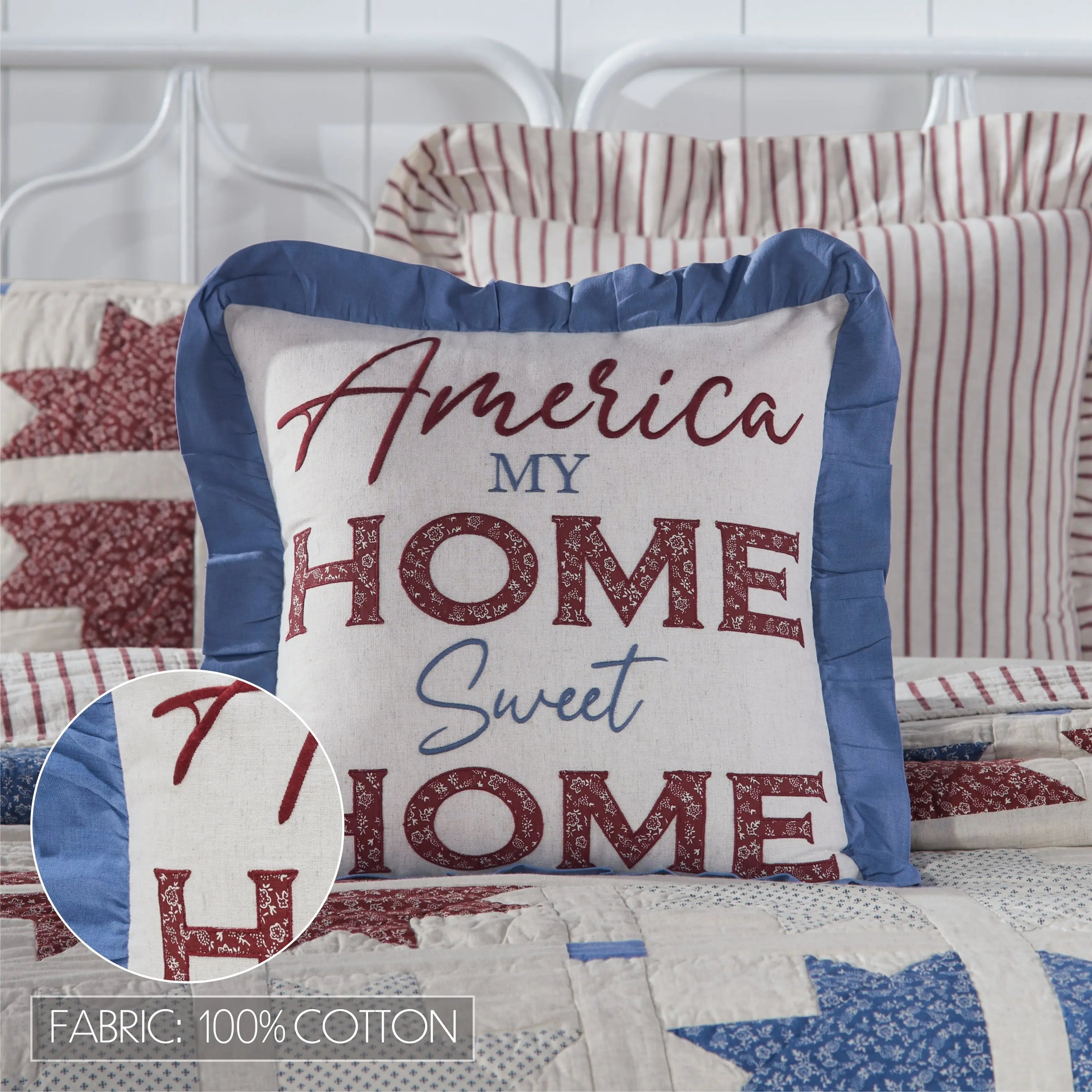 Decorative pillow with 'America My Home Sweet Home' text on a quilted background
