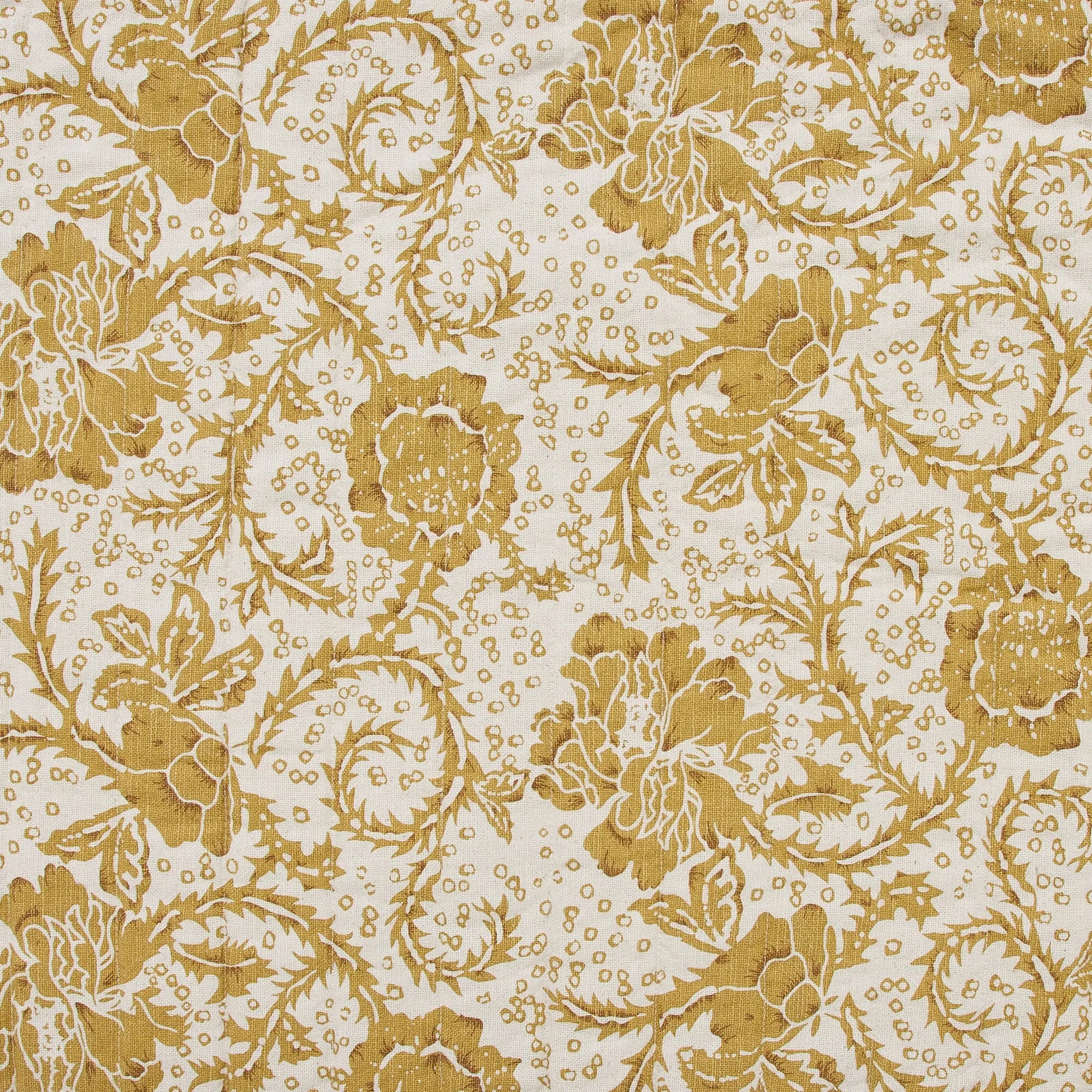 Gold floral pattern on a white background