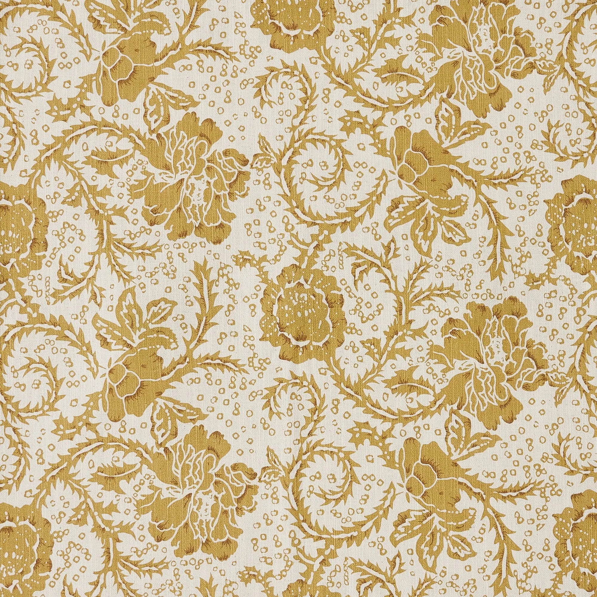 A close-up of a repeating floral damask pattern in warm gold and beige tones, showing large flowers, leaves, and scrolling vine motifs on an off-white background.