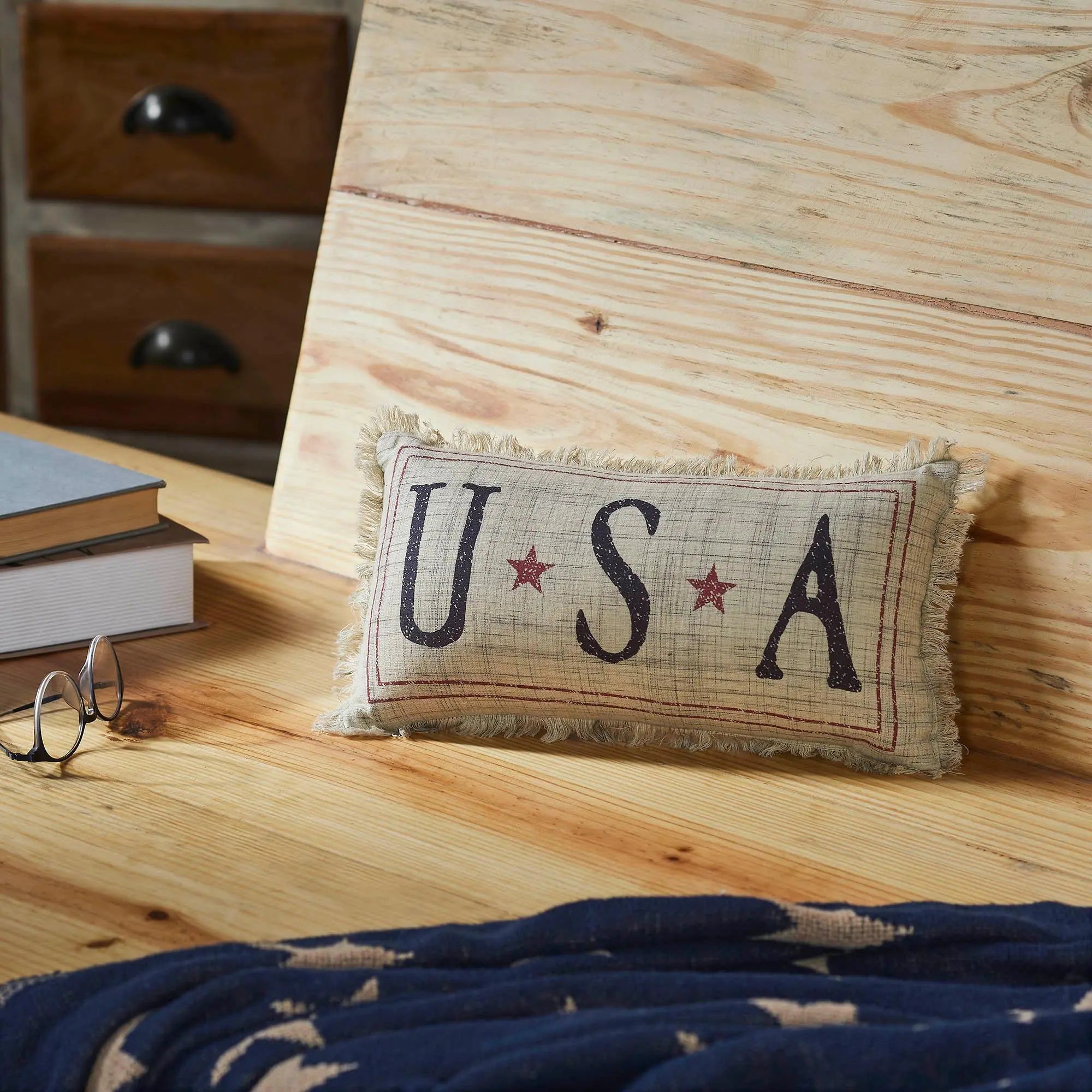 USA decorative pillow with stars on rustic wood, farmhouse home decor accent