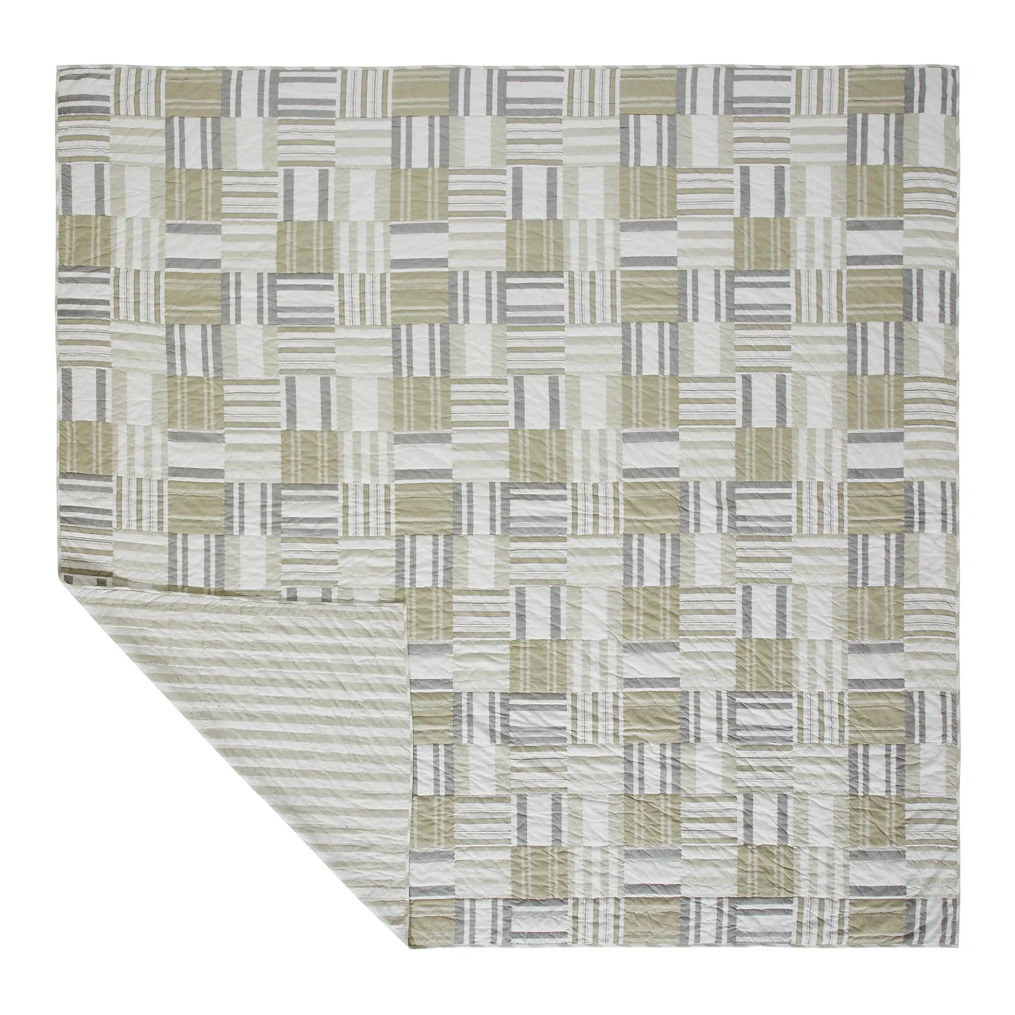 Patterned rug with geometric design on a white background
