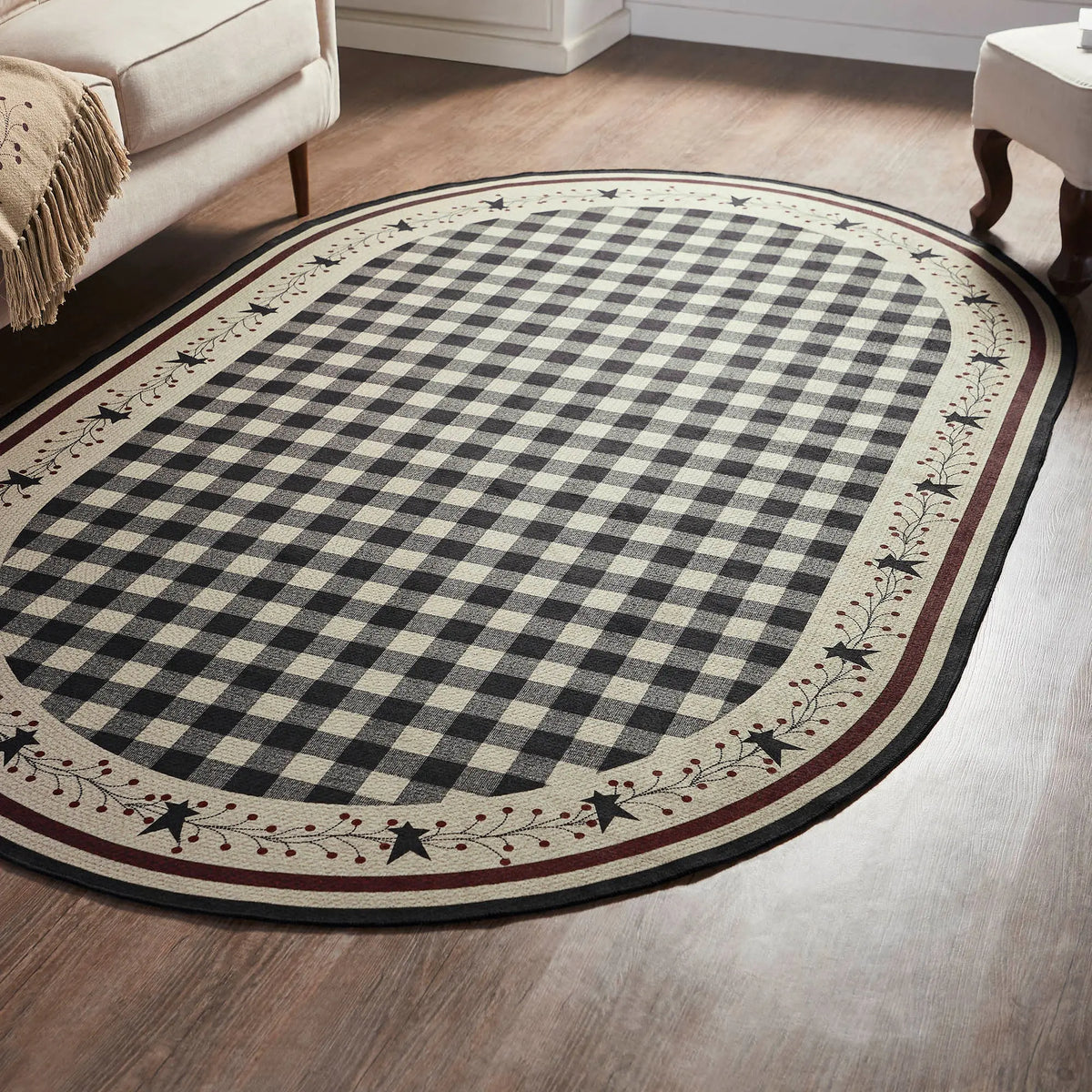 Round checkered rug with decorative border on a wooden floor