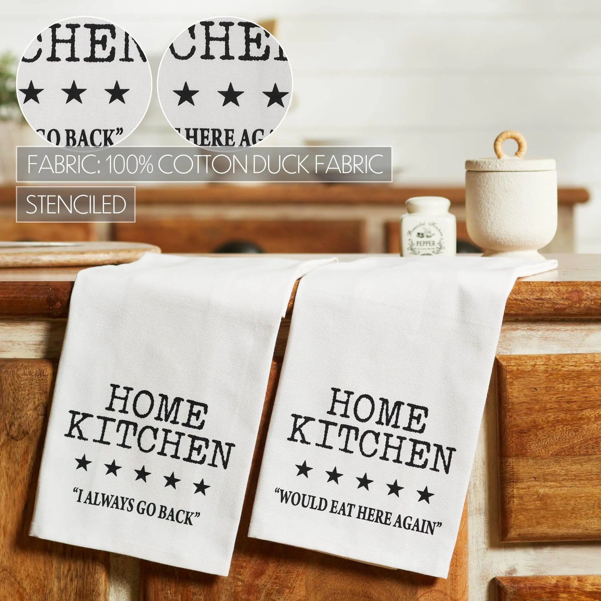 Two white towels with 'Home Kitchen' text on a wooden surface.
