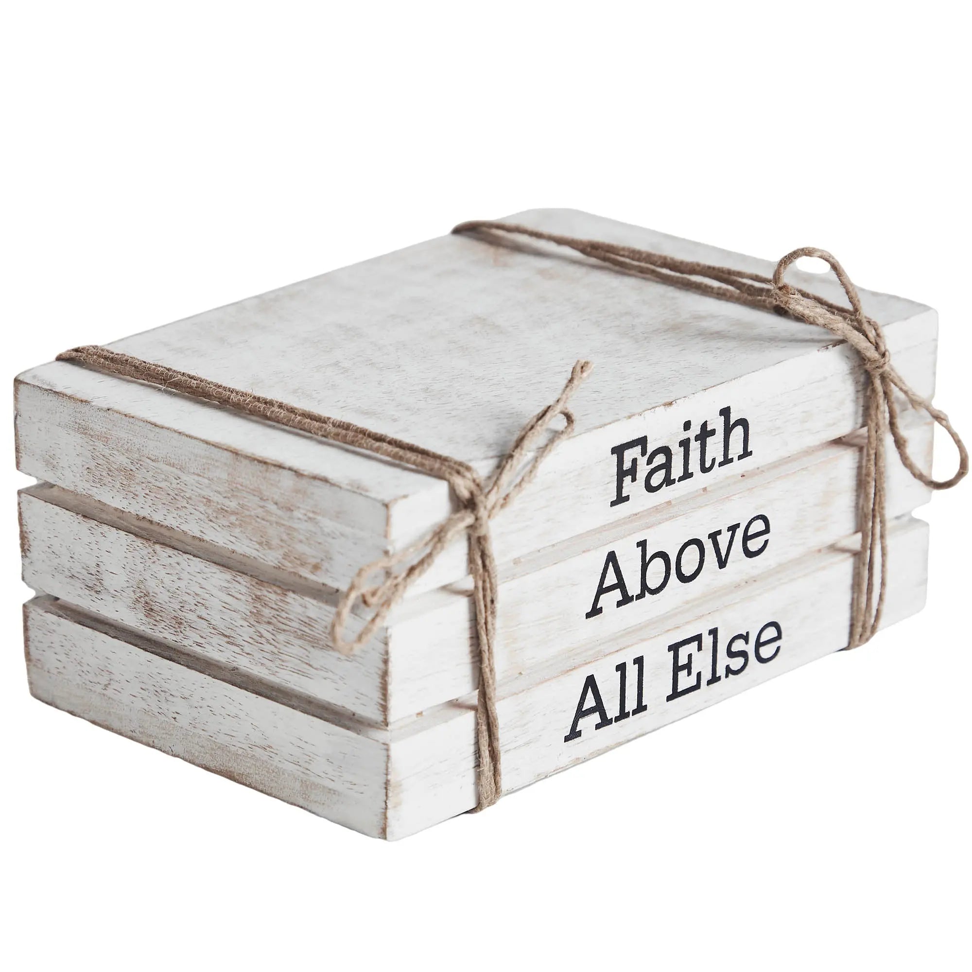 Stack of white wooden blocks with 'Faith Above All Else' text, tied with twine on a white background