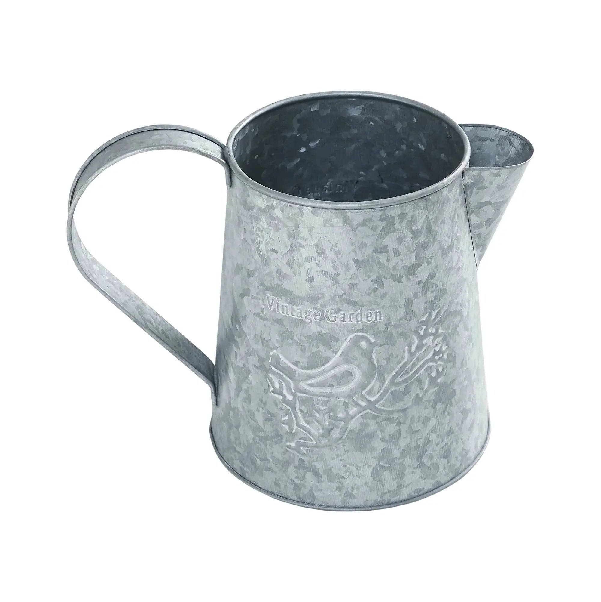 Metal watering can with embossed design on a white background