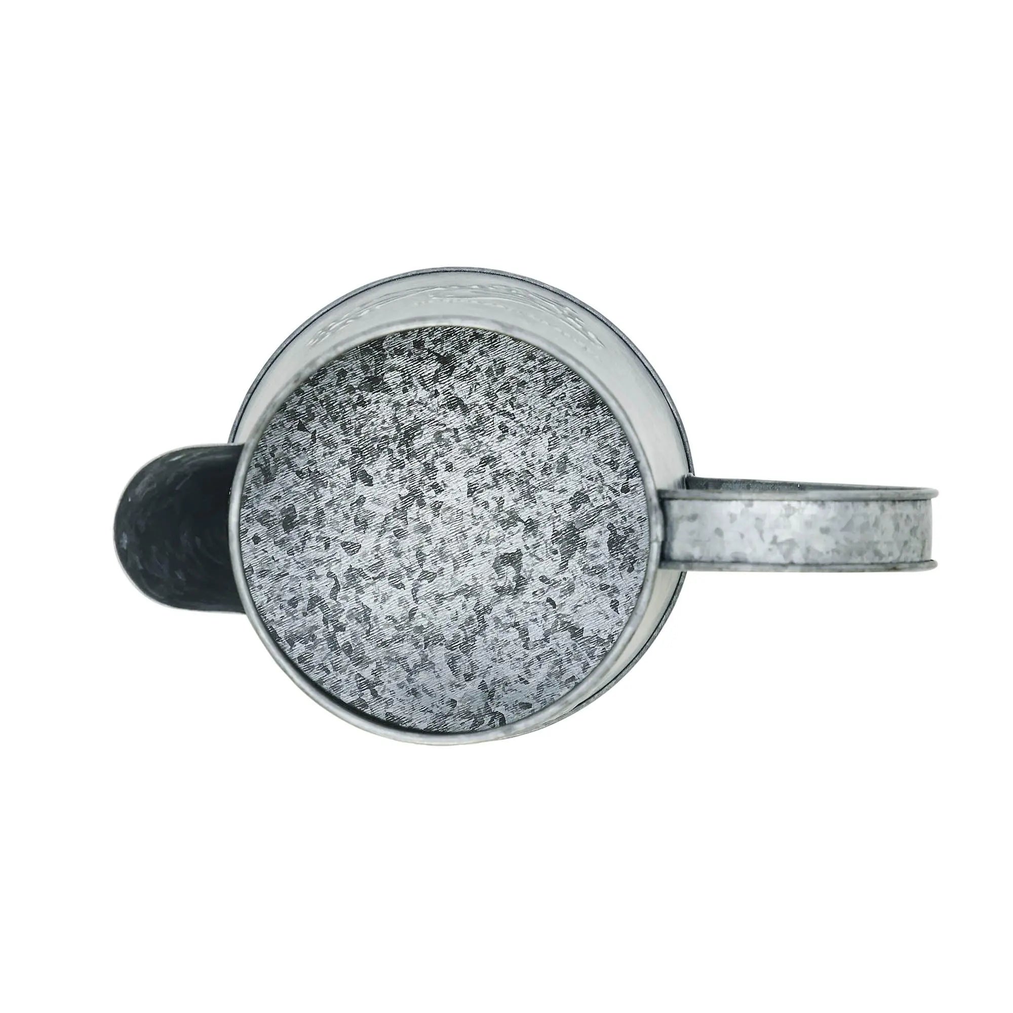 Metallic mug with speckled interior on a white background