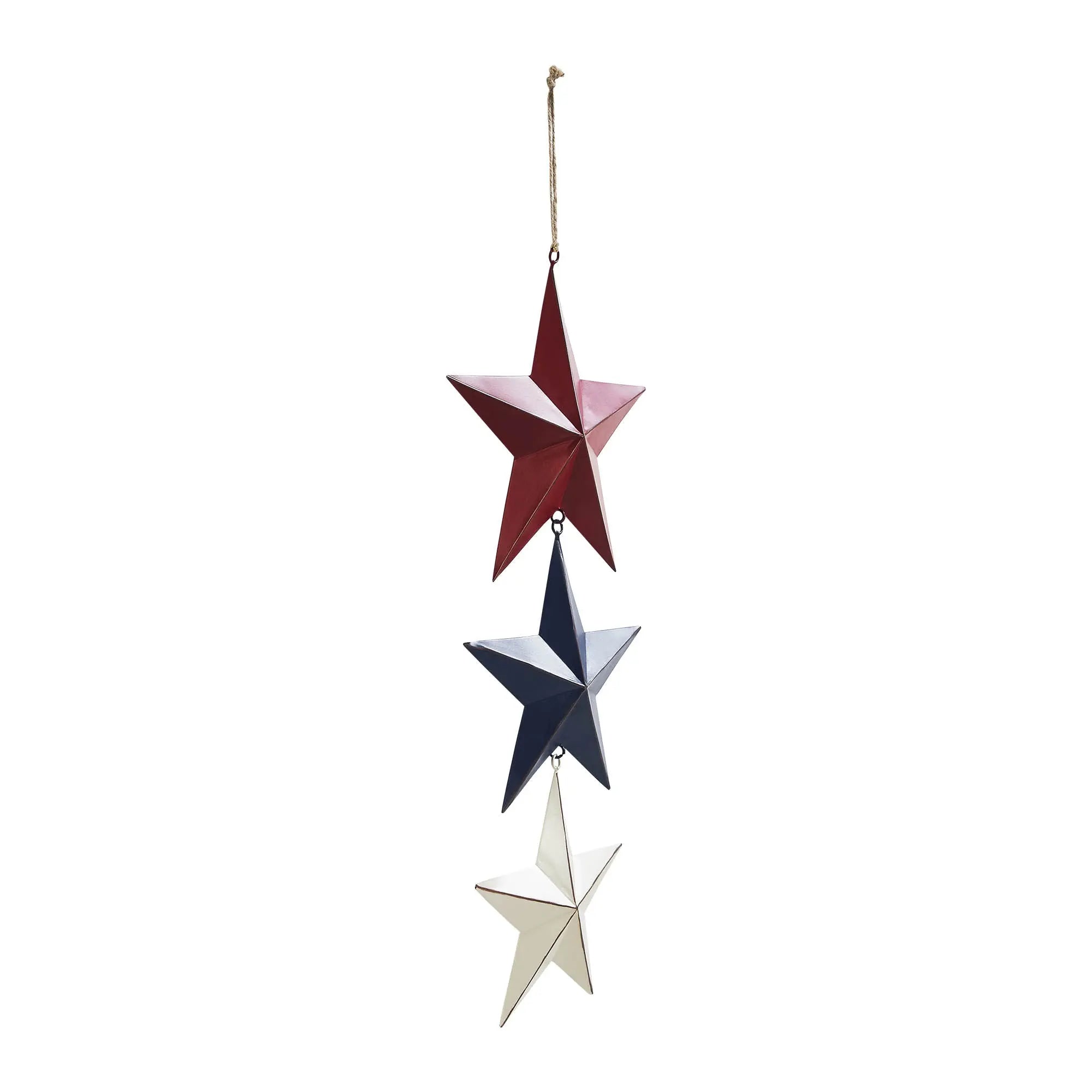 Decorative hanging stars in red, blue, and white on a white background