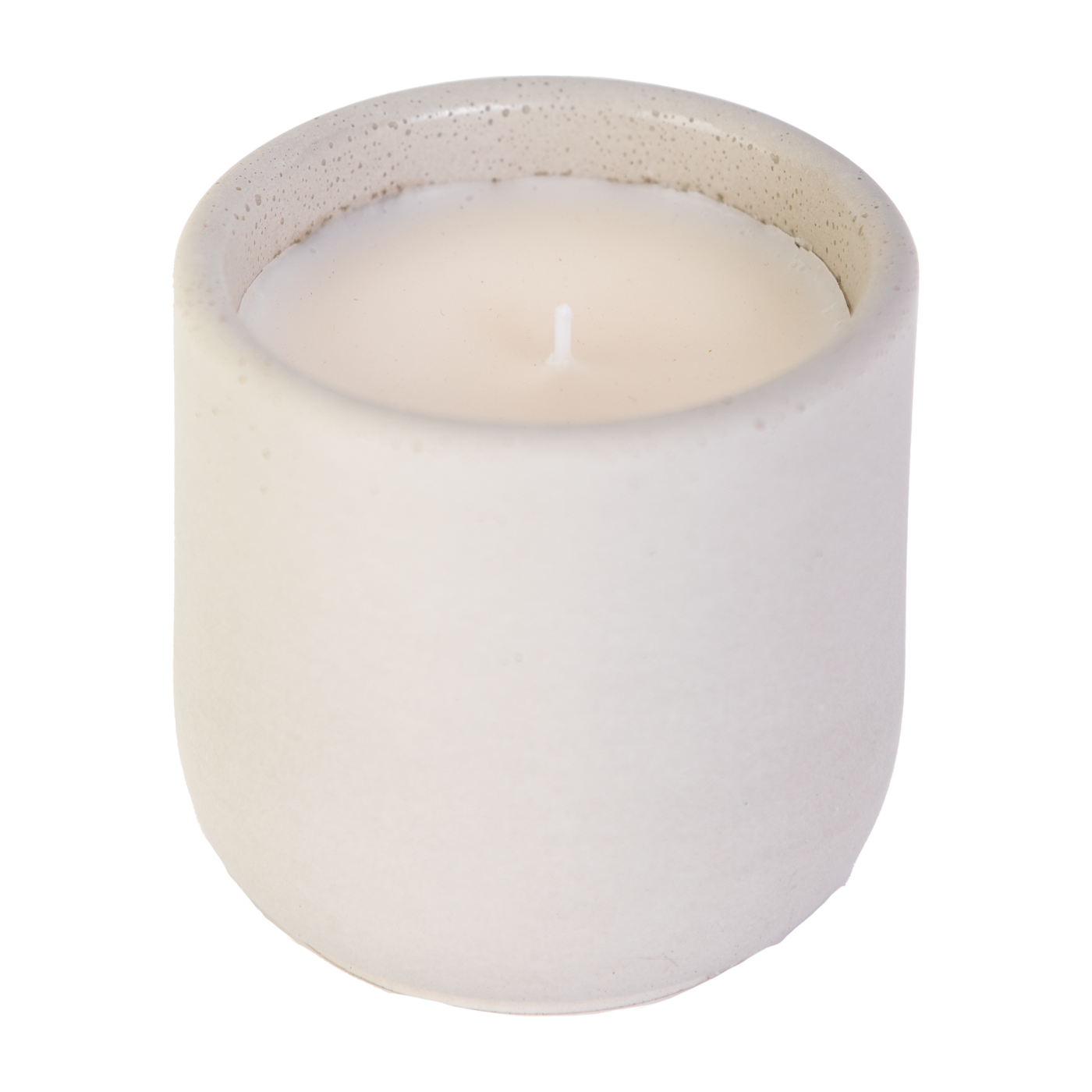 White candle in a textured ceramic holder on a white background