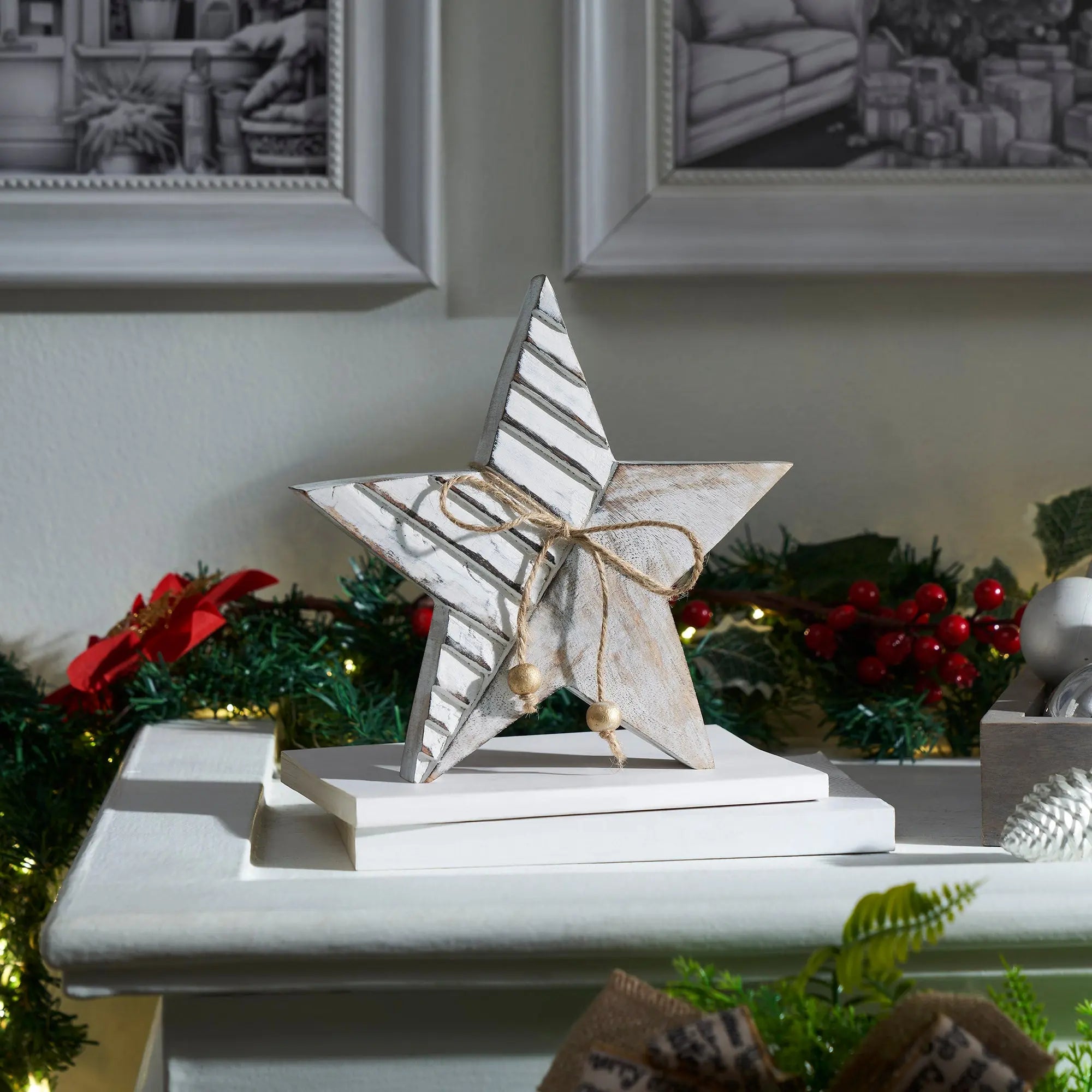 Decorative star with a bow on a mantel with Christmas decorations