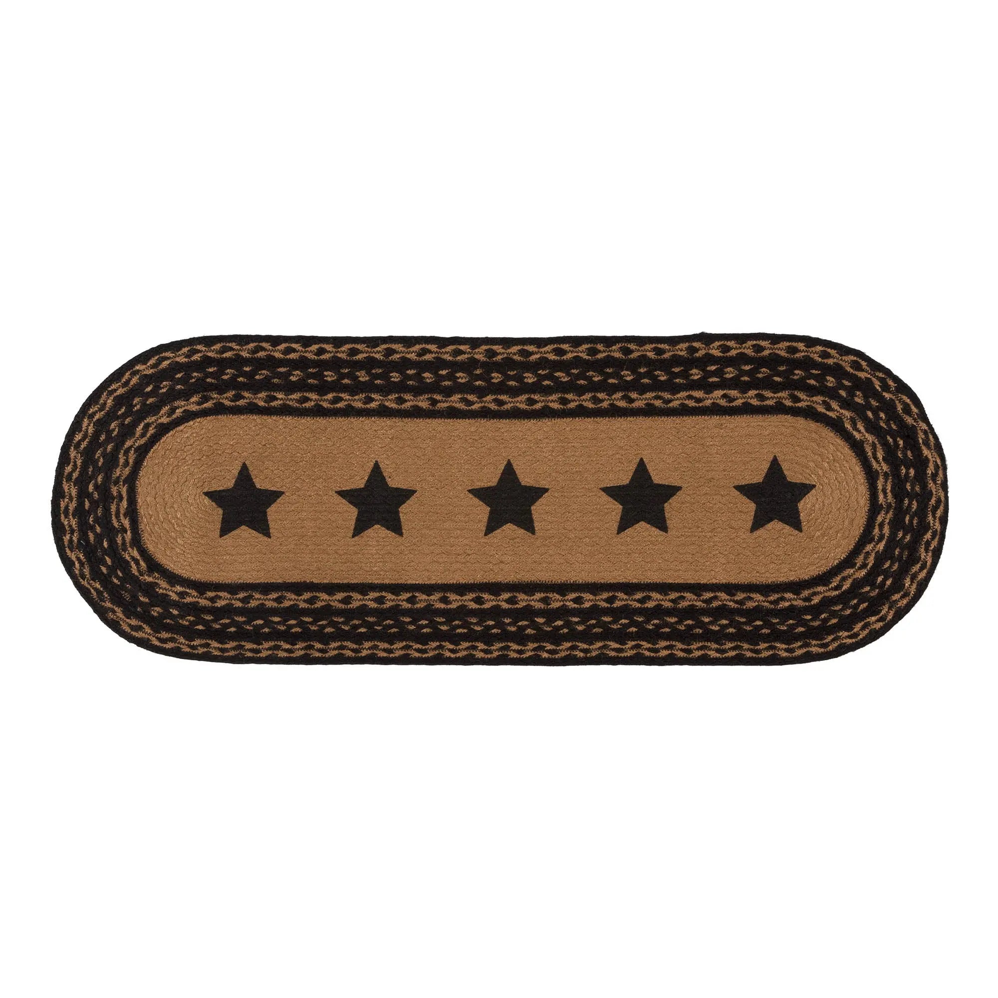 Rectangular braided rug with star pattern on a white background
