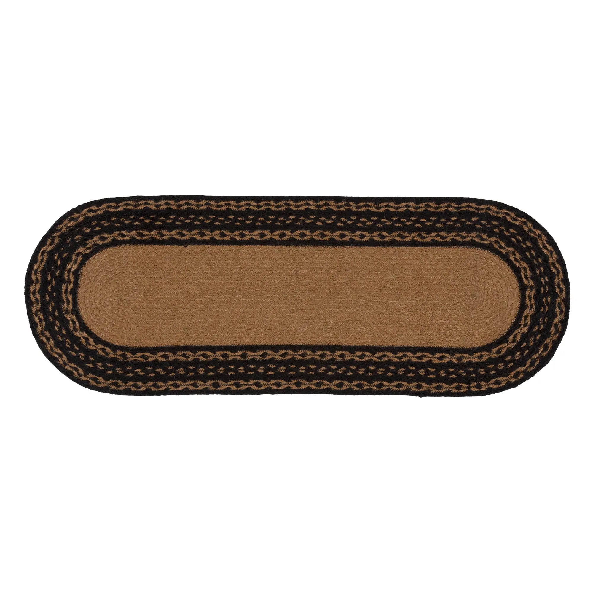 Brown braided rug with black border on a white background