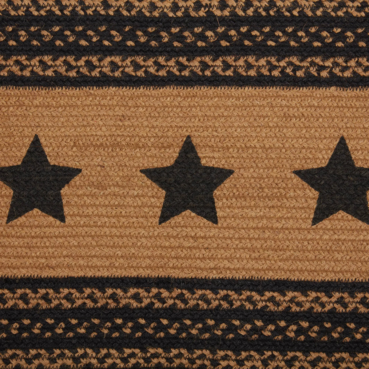 Textile with star pattern and geometric designs in brown and black