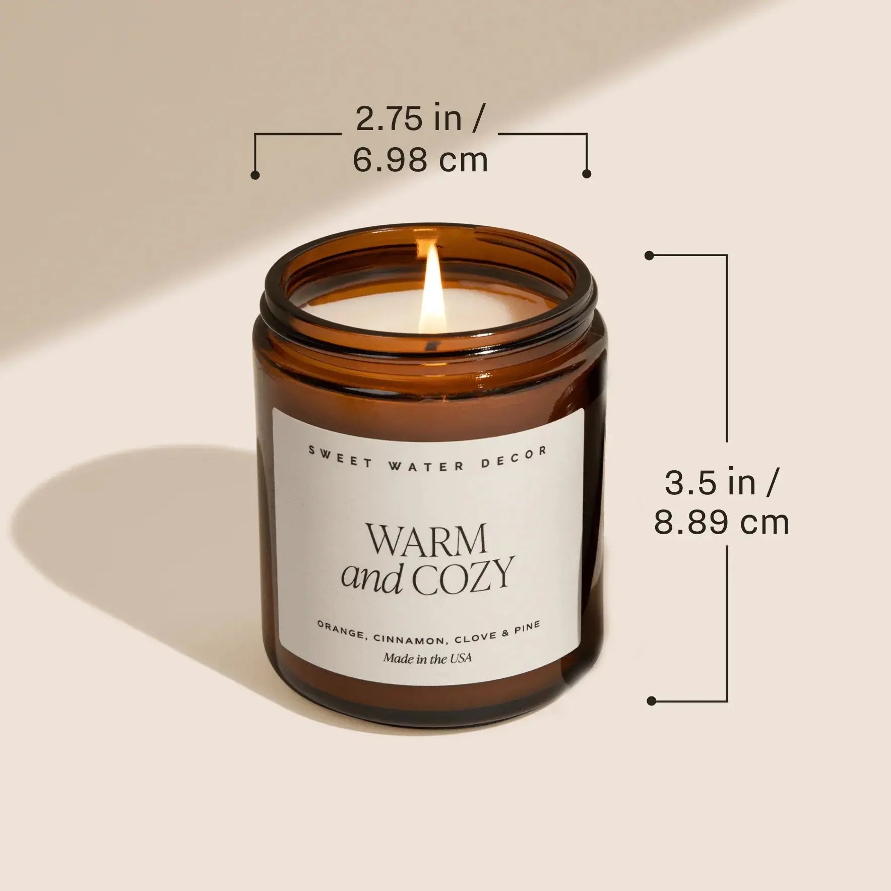 Warm and Cozy scented candle in amber jar, farmhouse home decor with orange cinnamon clove pine notes