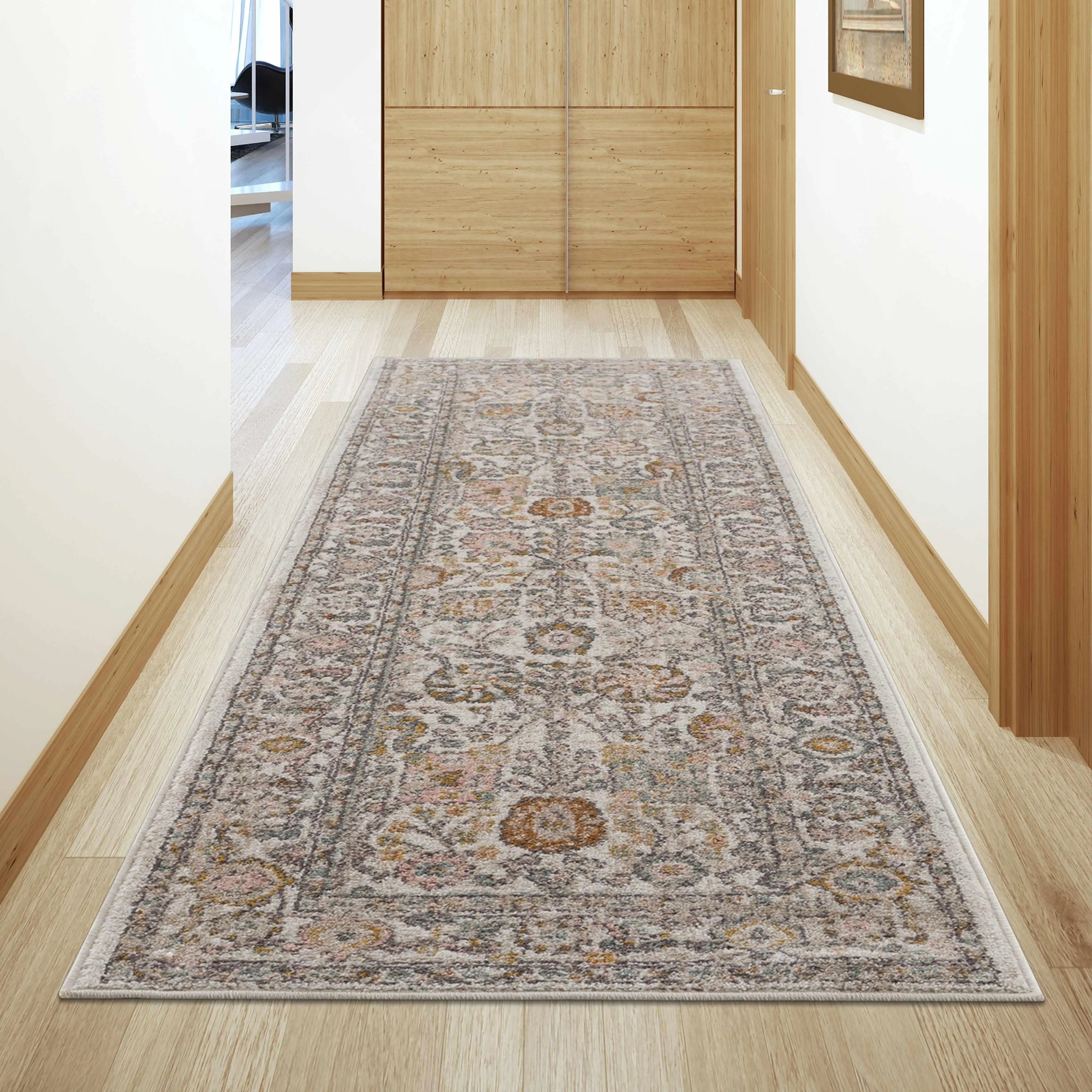 Vintage-style runner rug with floral pattern in hallway, perfect for farmhouse or cottage decor