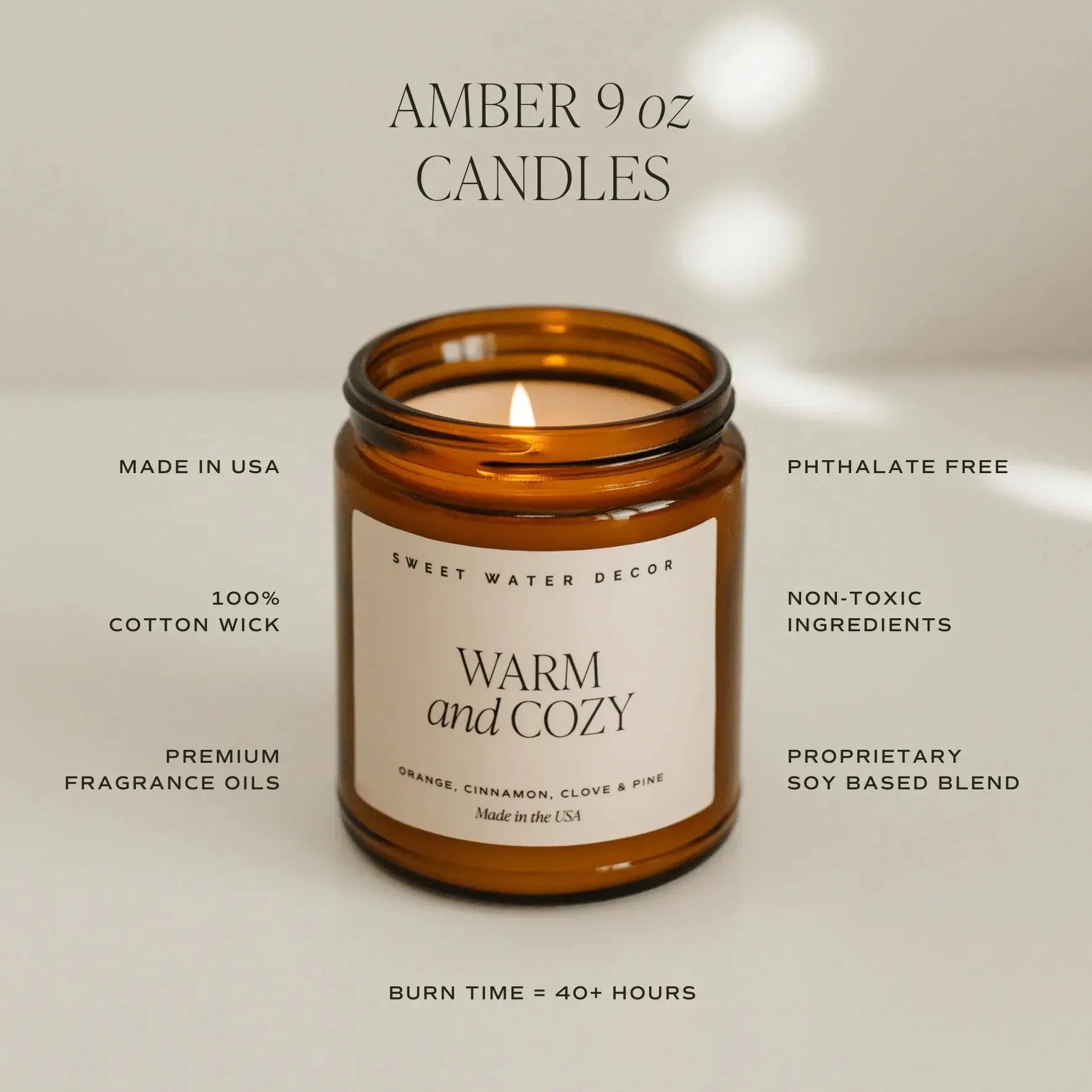Amber 9 oz candle with 'Sweet Water Decor' label on a neutral background
