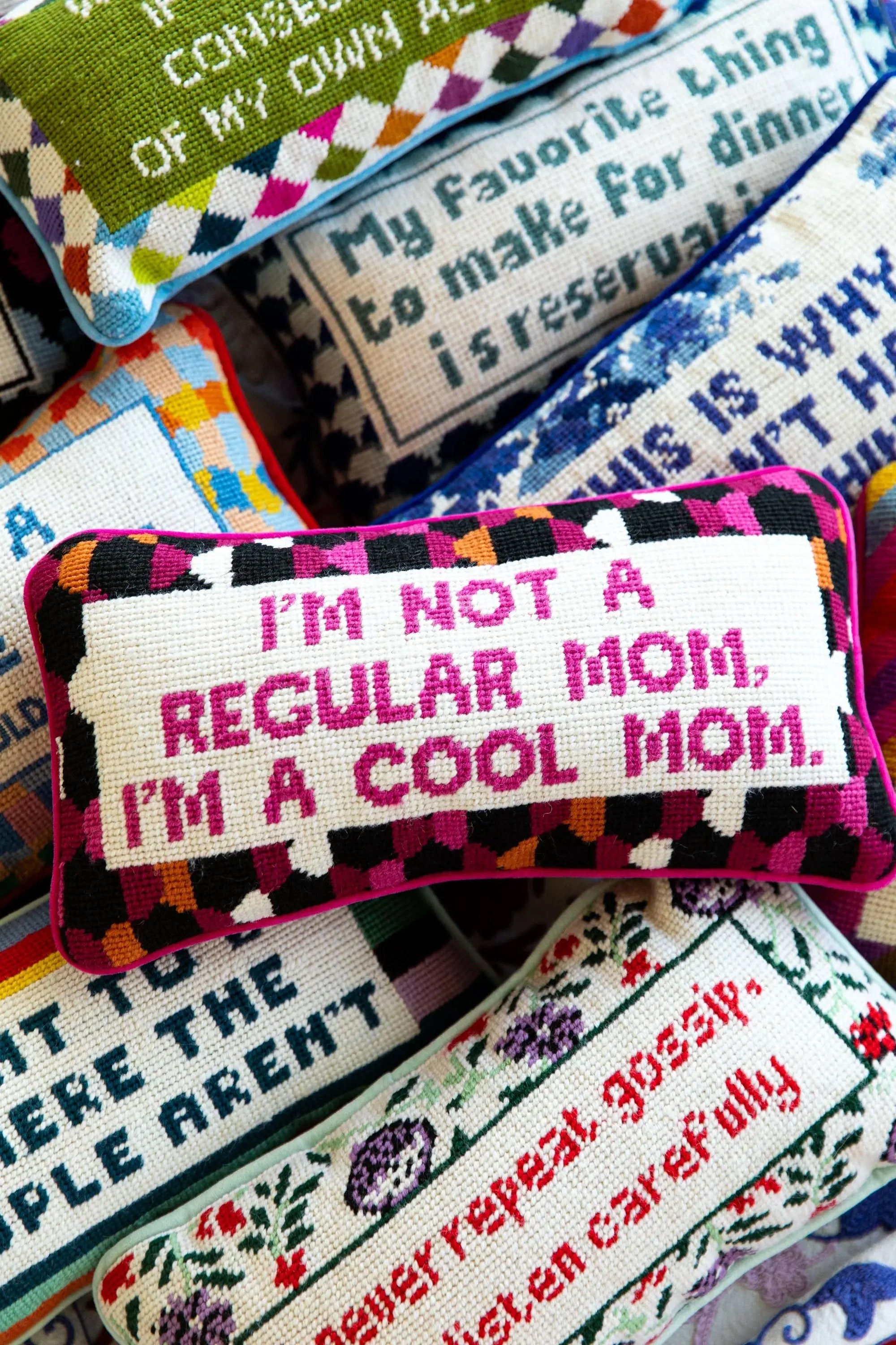 Colorful needlepoint pillows with funny quotes, cozy farmhouse decor for living room or bedroom