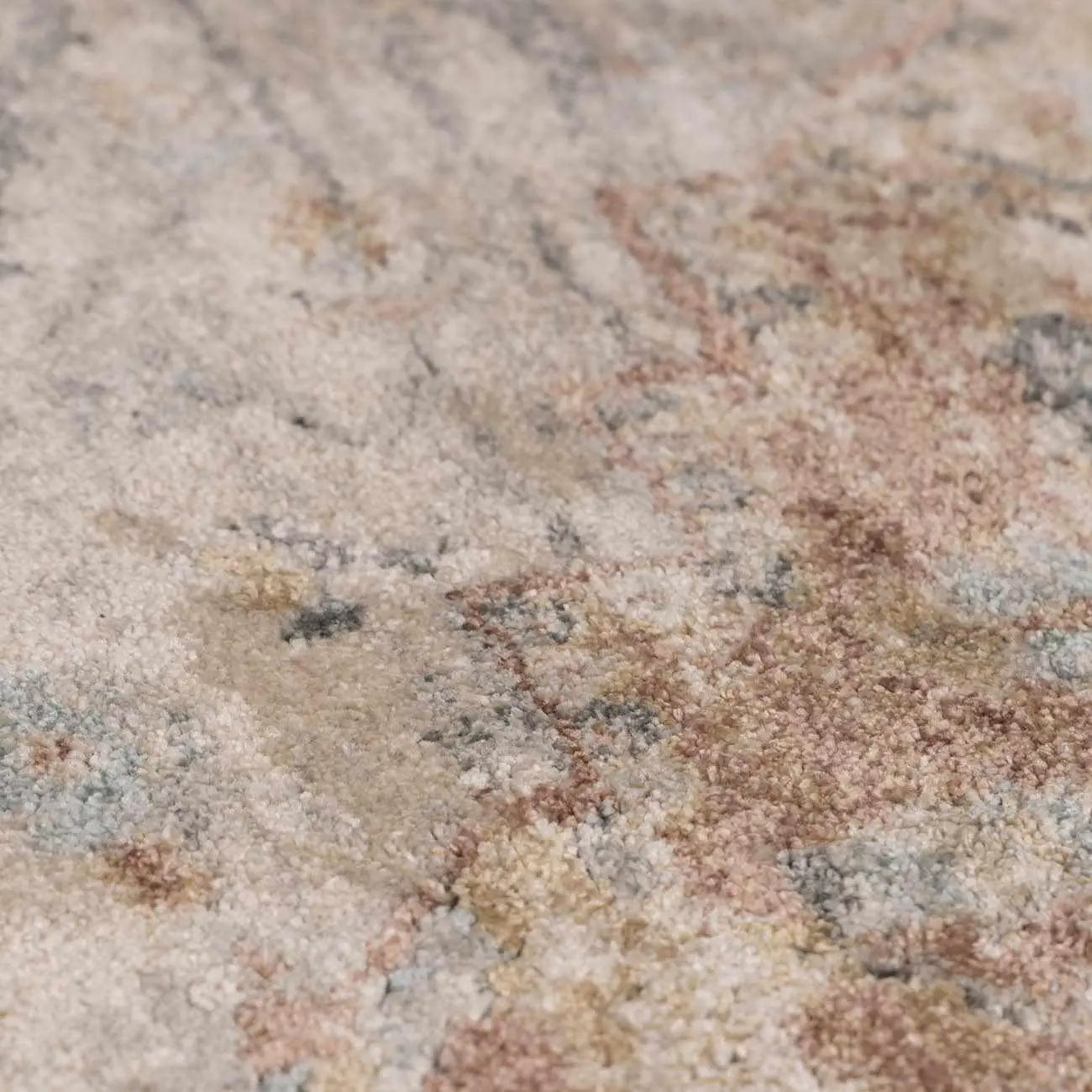 Cozy farmhouse rug with soft beige, blush, and gray abstract pattern for warm cottage-style living spaces