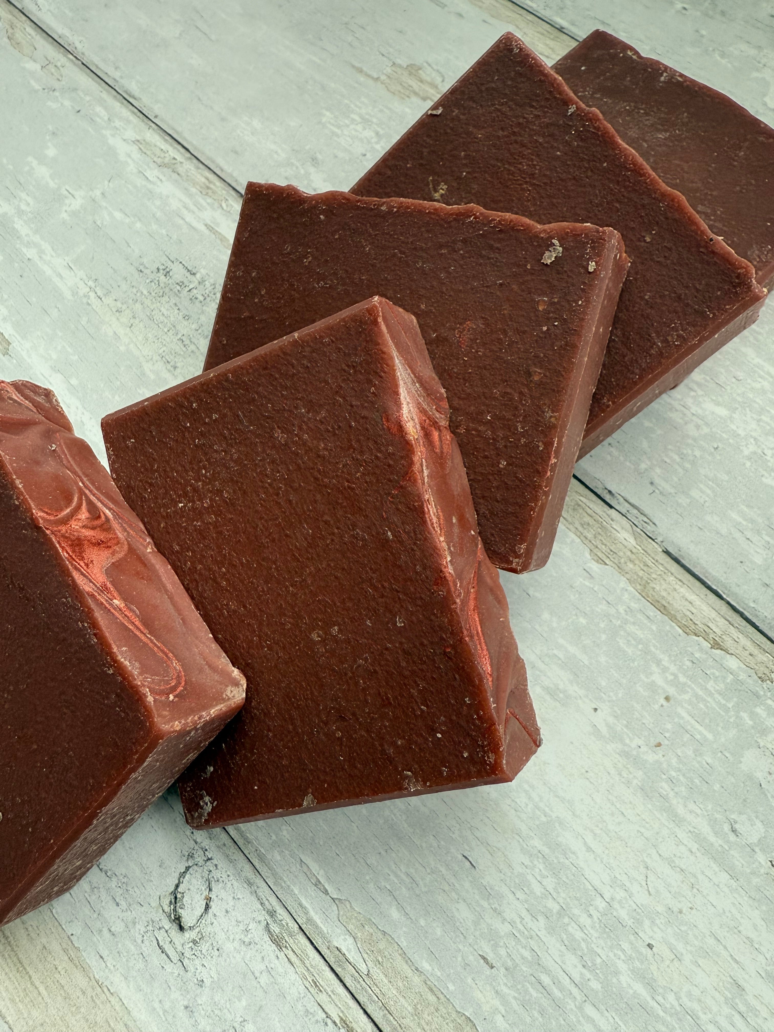 Chocolate bars on a wooden surface