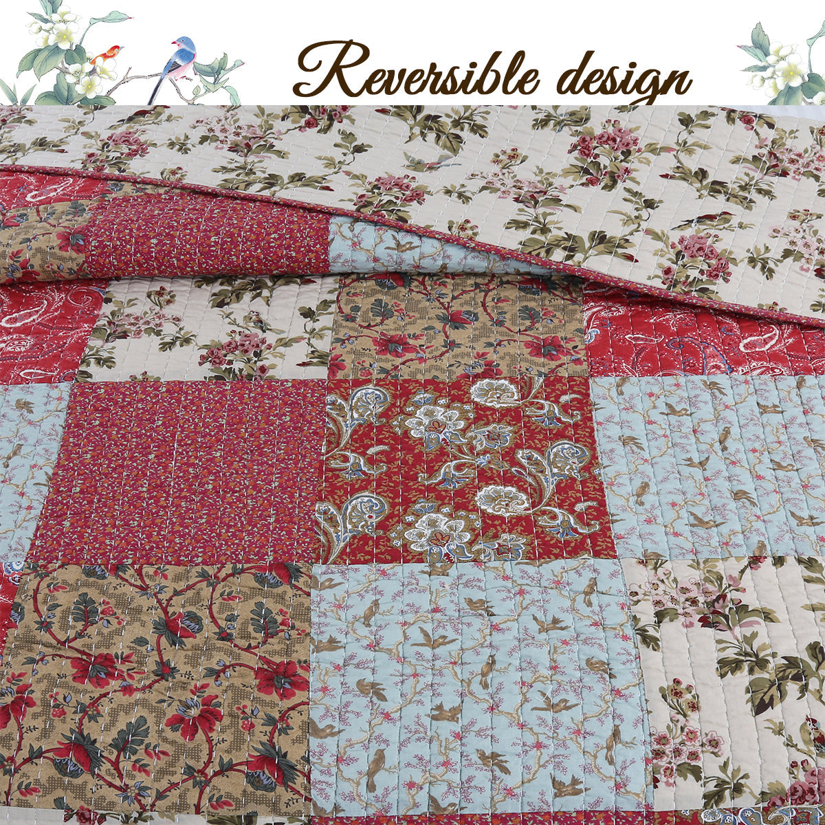 A patchwork quilt with a reversible design, featuring various floral and paisley patterns in red, beige, light blue, and cream. The top fold shows the reverse side with a floral print on a cream background.
