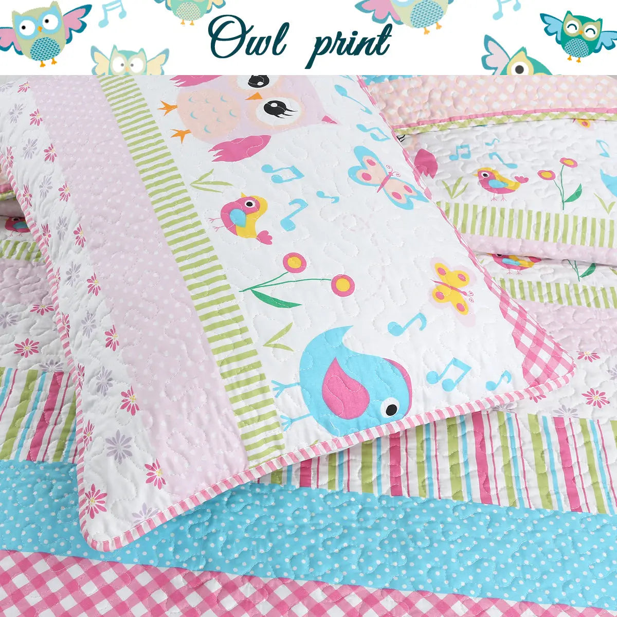 Home Sweet pink owl print reversible quilt bedding set with colorful striped design and coordinating decorative pillows for a girl's bedroom.