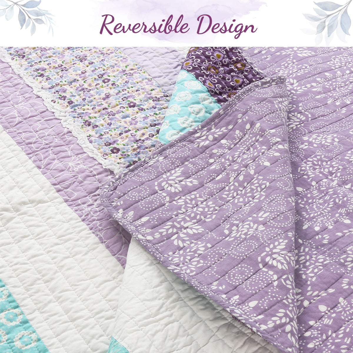A close-up of a quilted reversible blanket or quilt showing two sides: one side is lavender with white floral quilting, and the underside shows a white quilted base with lavender border and a small turquoise floral section. The top of the image has a banner reading 'Reversible Design' with decorative floral corners.