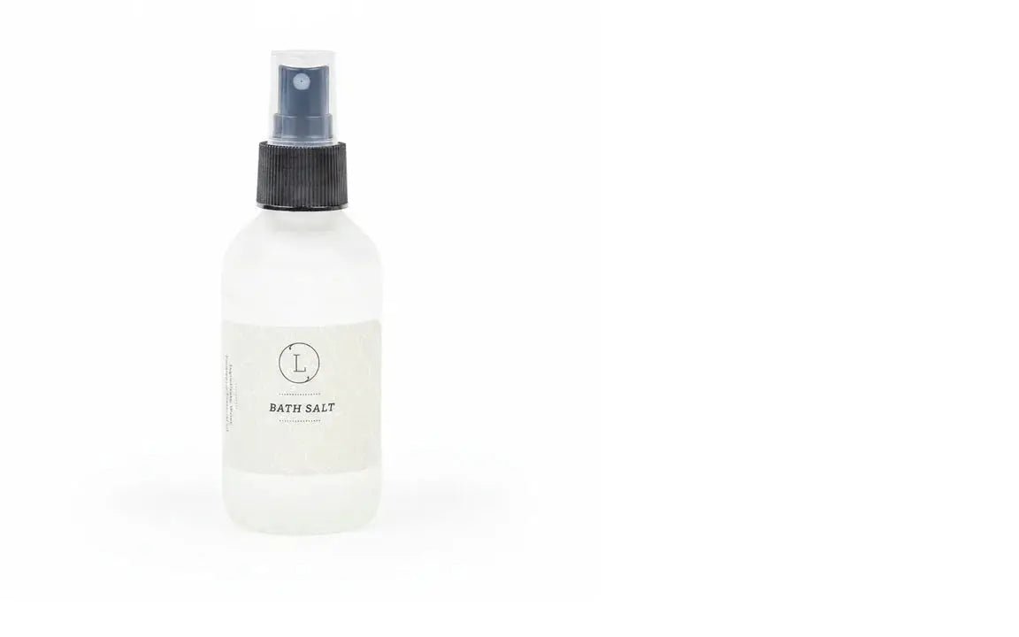 Frosted glass spray bottle labeled Bath Salt, minimalist design for cozy home bath essentials