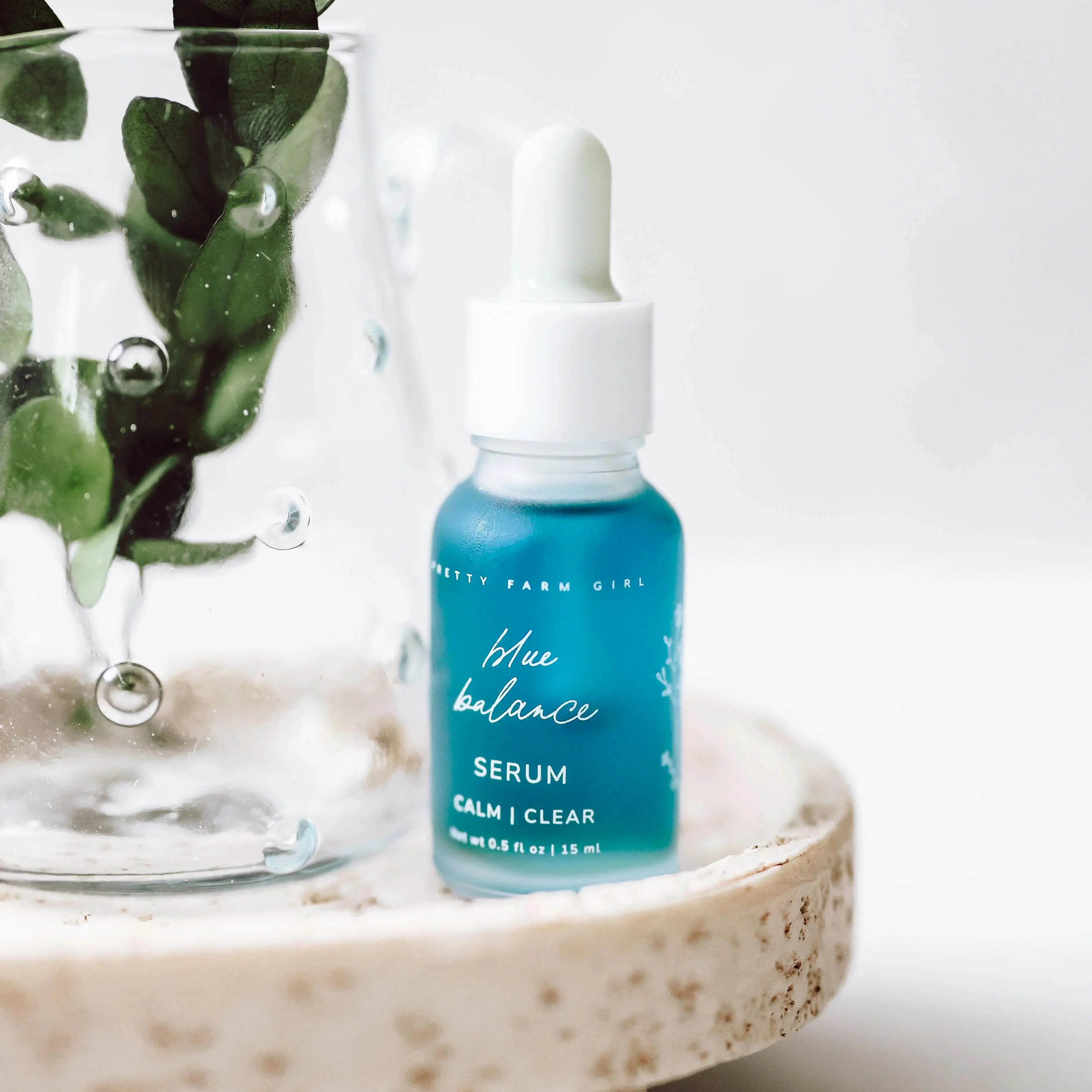 Blue Balance Serum for calm clear skin, farmhouse style bath essential with greenery decor