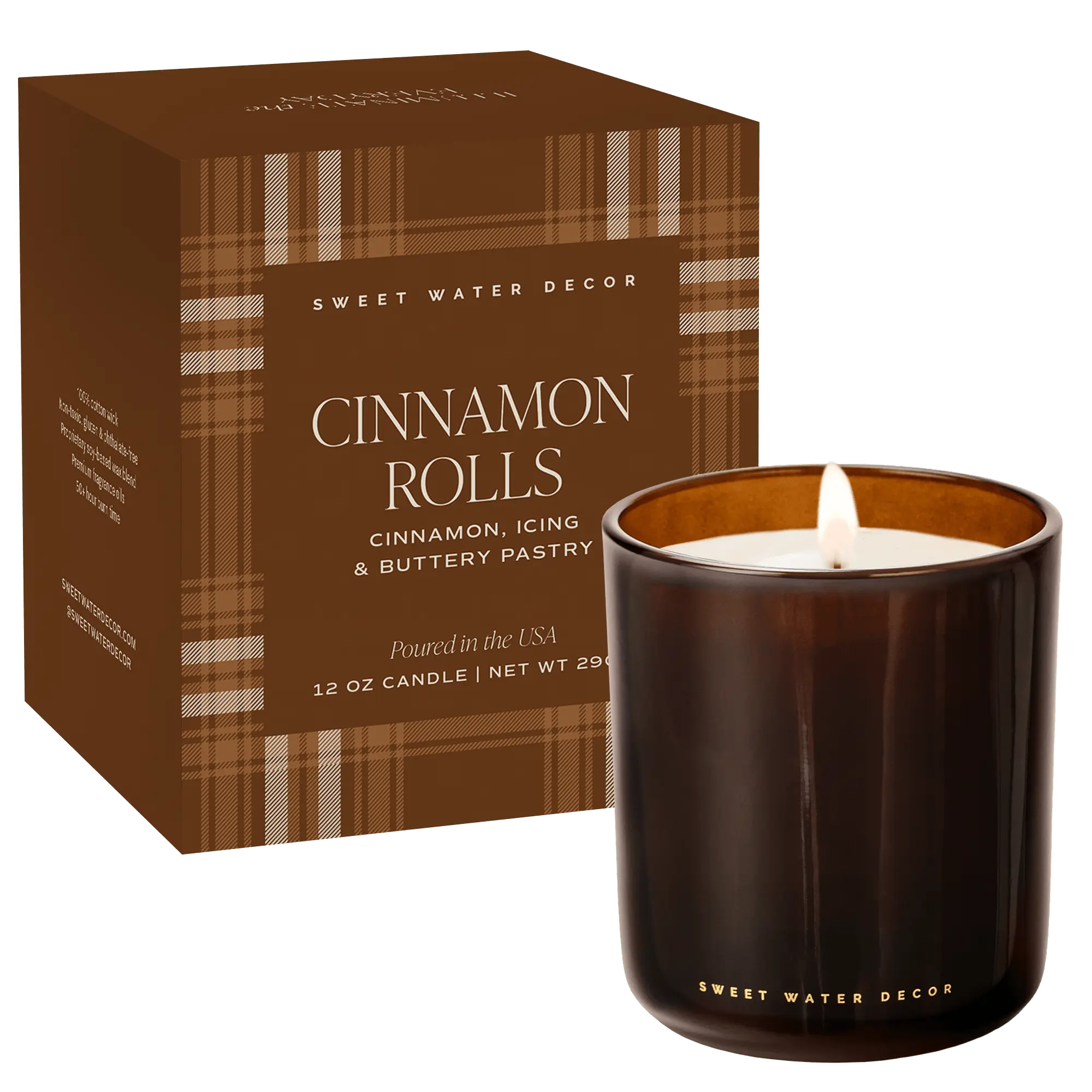 A 12 oz candle by Sweet Water Decor in a dark amber glass jar with a lit flame, shown next to its brown box featuring a plaid pattern. The product is labeled 'Cinnamon Rolls' with scent notes of cinnamon, icing, and buttery pastry, set against a solid dark green background.