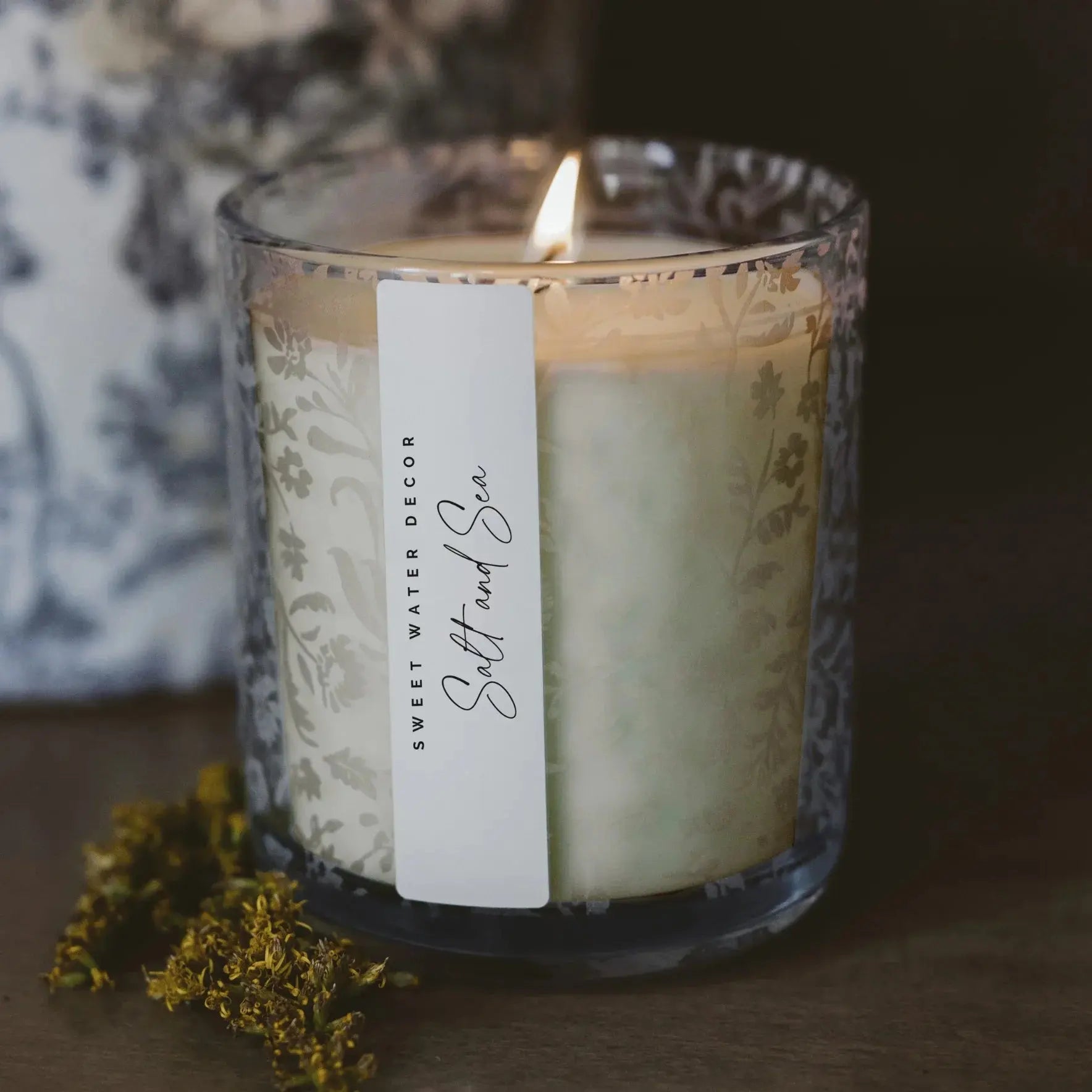 Salt and Sea scented candle in floral glass jar, cozy farmhouse decor with dried flowers