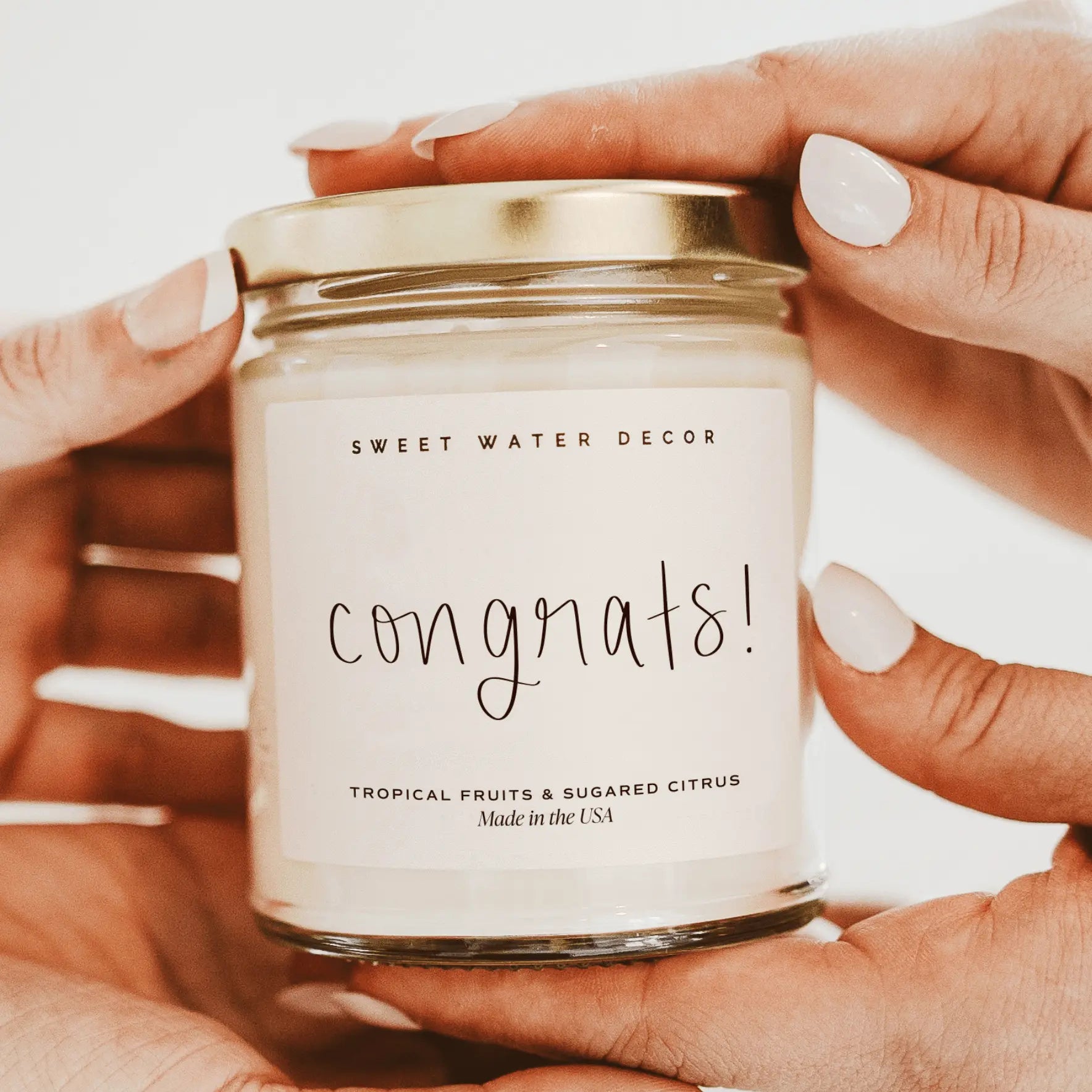 Congrats! scented candle in glass jar with gold lid, tropical fruits & sugared citrus aroma, perfect gift