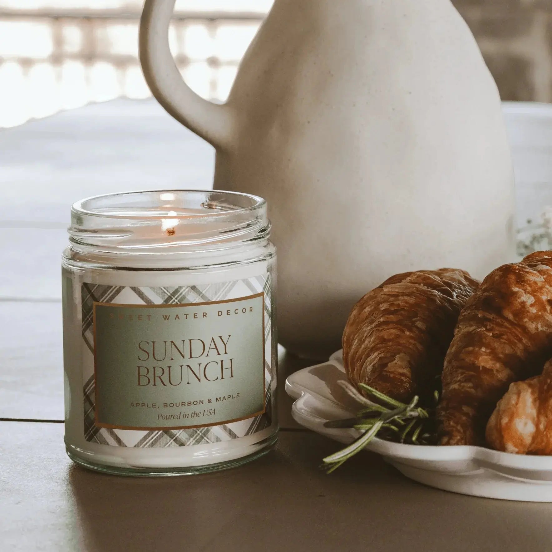 Sunday Brunch scented candle with apple bourbon maple notes, farmhouse decor, croissants, and ceramic pitcher