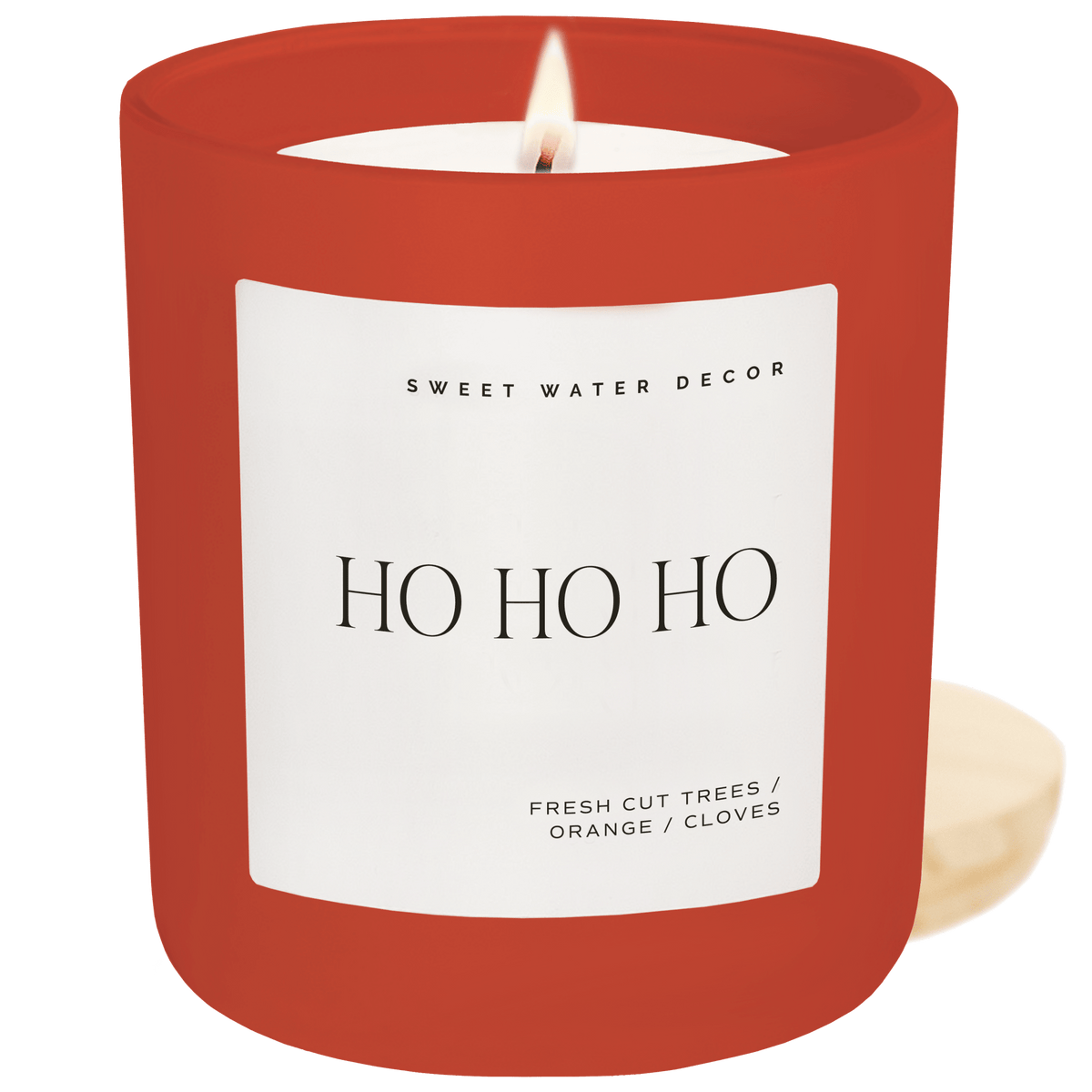 Red candle with 'Love You' label and Sweet Water Decor branding on a green background