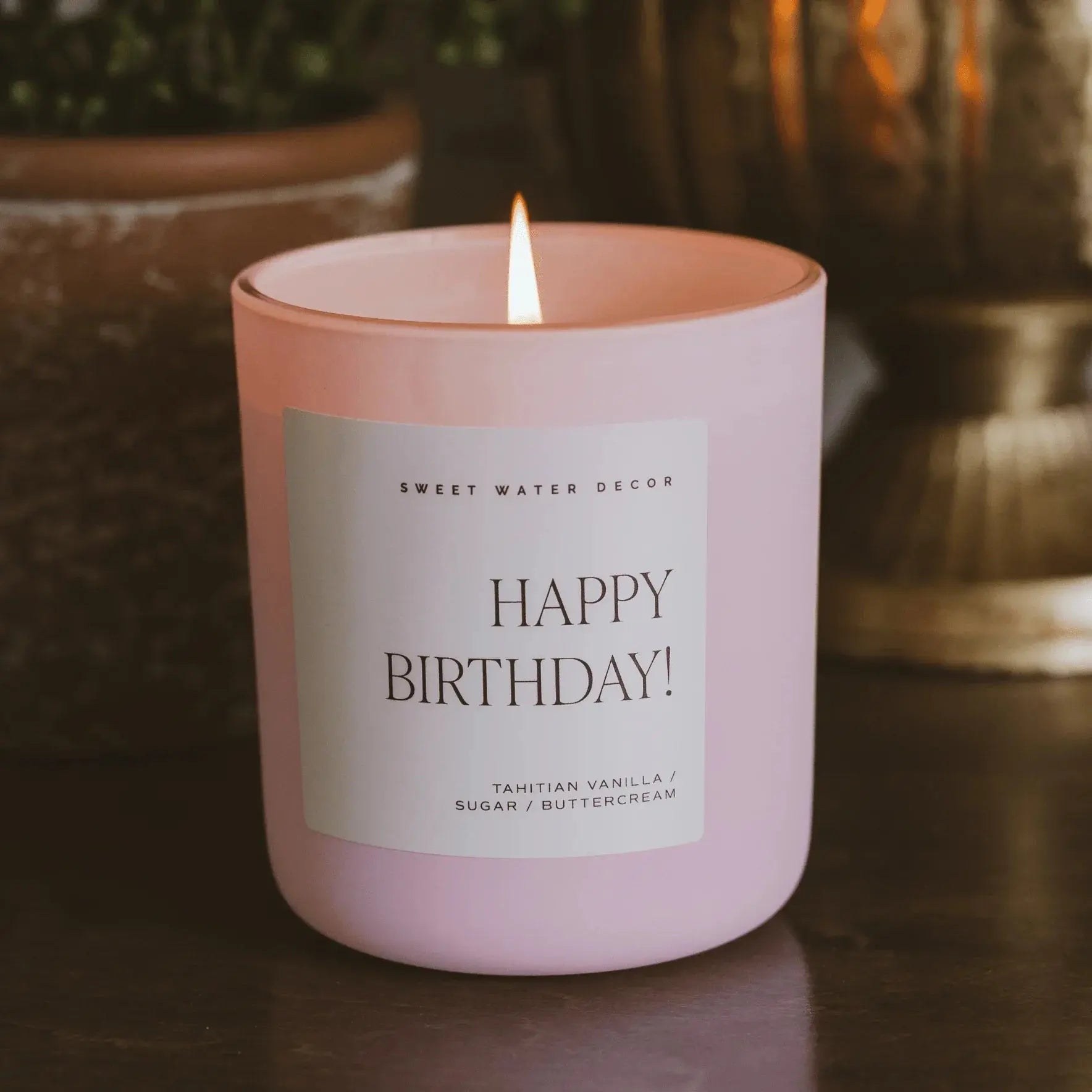 Happy Birthday candle in pink glass jar, lit with vanilla sugar buttercream scent, cozy home decor