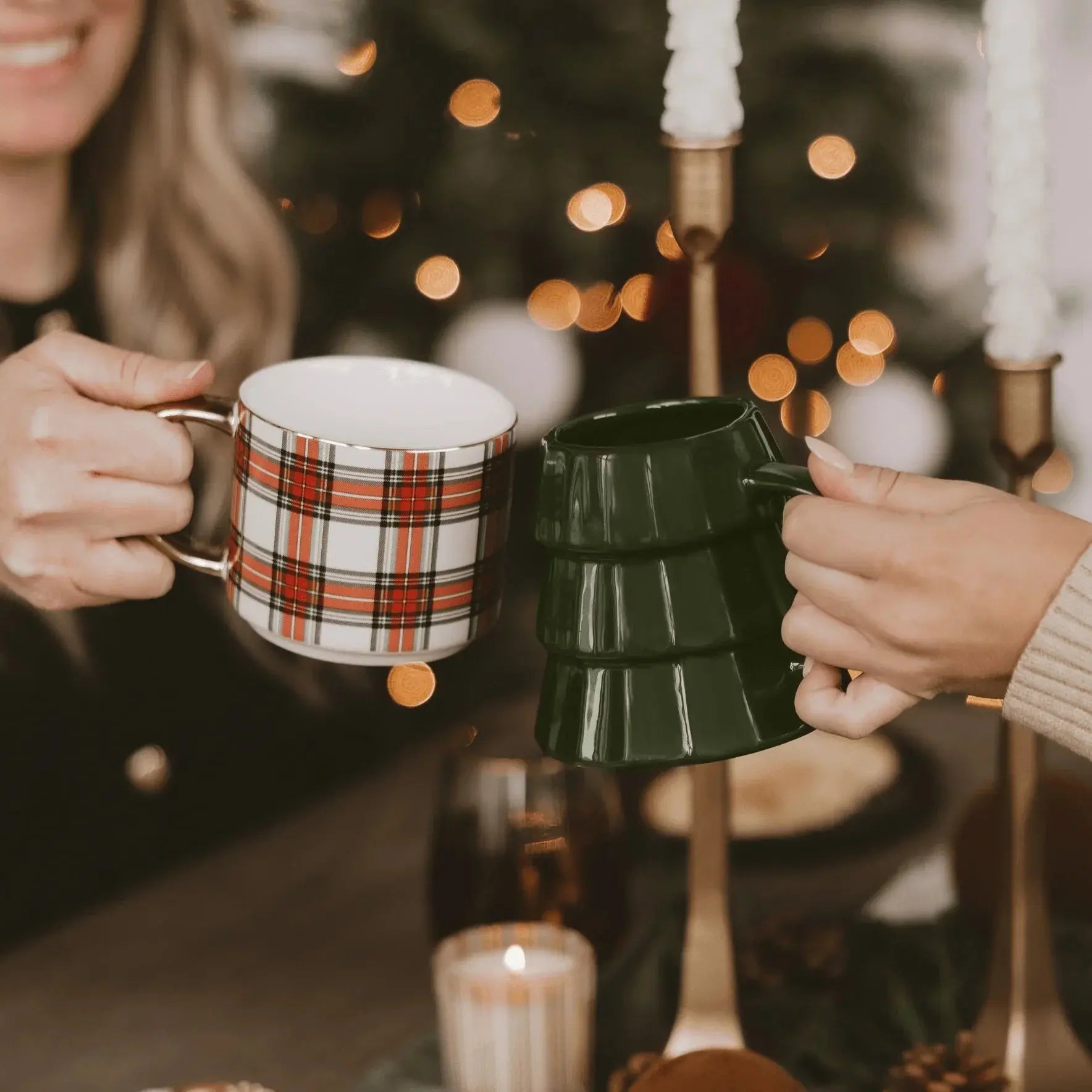 Cozy holiday mugs: plaid and green tree-shaped, perfect for farmhouse Christmas decor and warm drinks.