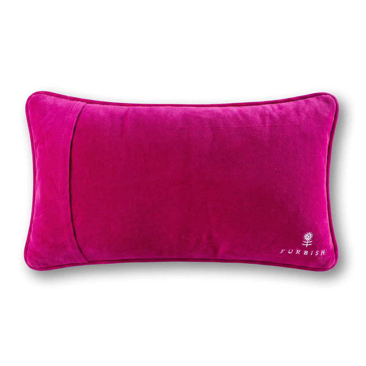A rectangular magenta velvet lumbar pillow with a small white embroidered 'FURNISH' logo in the bottom right corner, shown on a clean white background.
