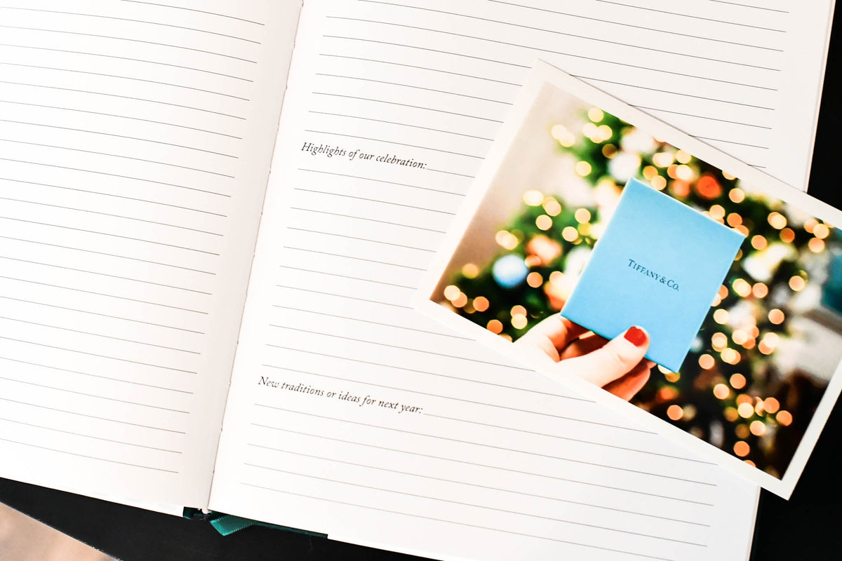holiday memory book by Duncan & Stone with a photo and small card from Tiffany & Co.