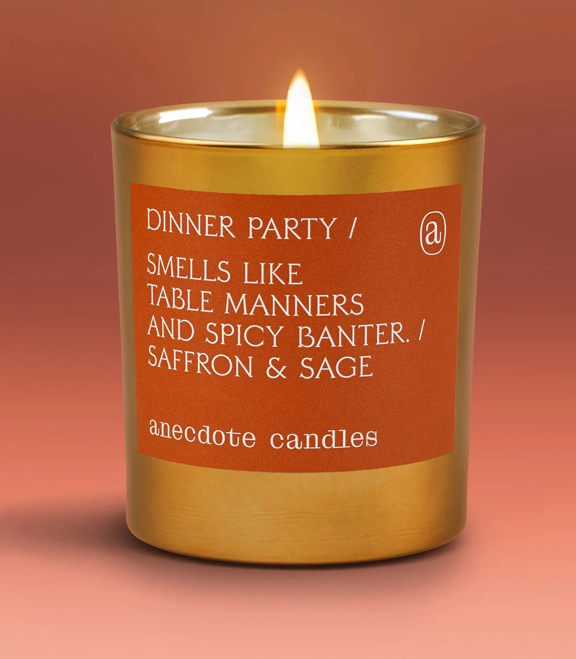 Candle with a label on an orange background