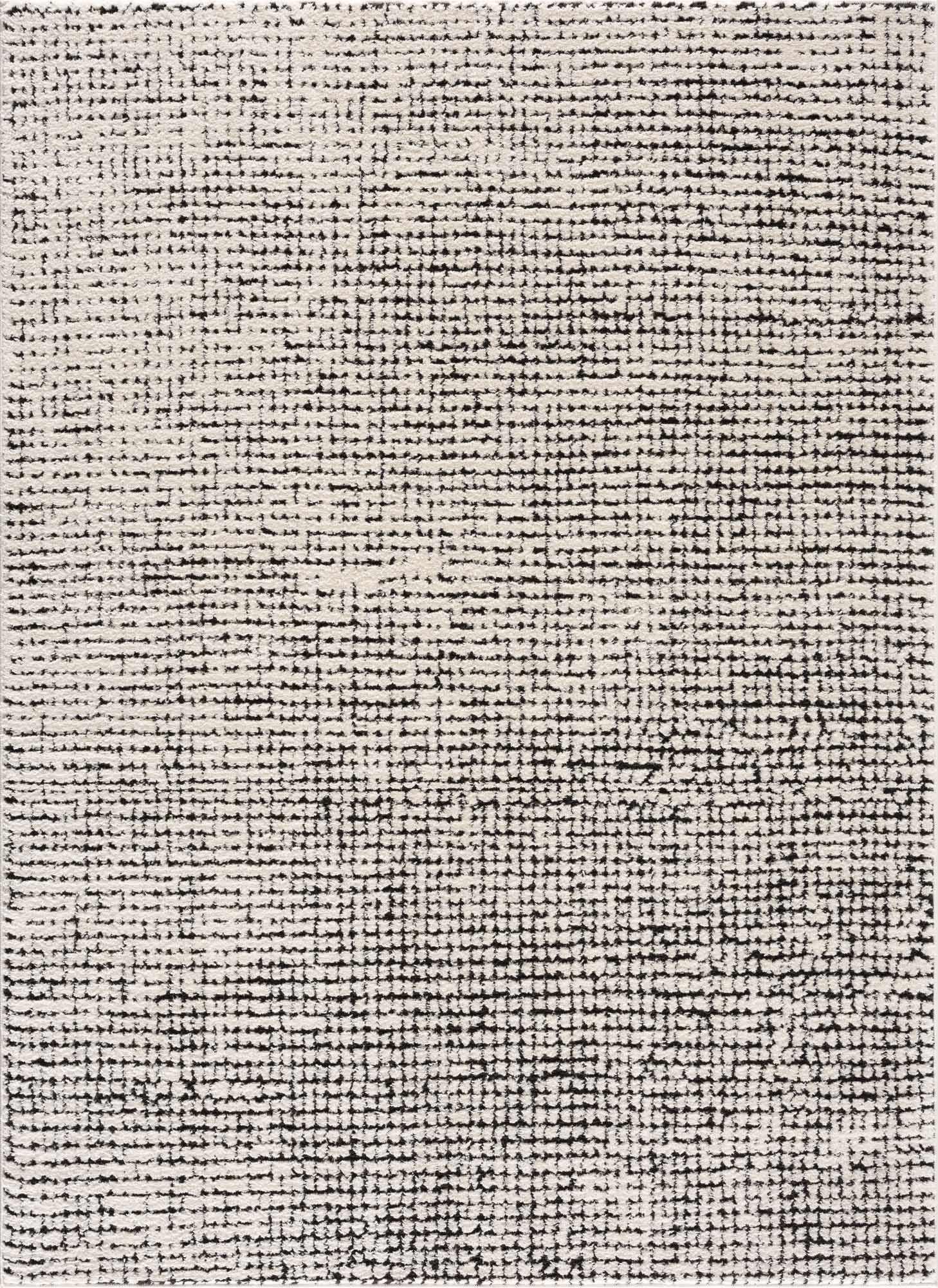 Cream and black textured area rug with modern geometric pattern, perfect for cozy farmhouse decor