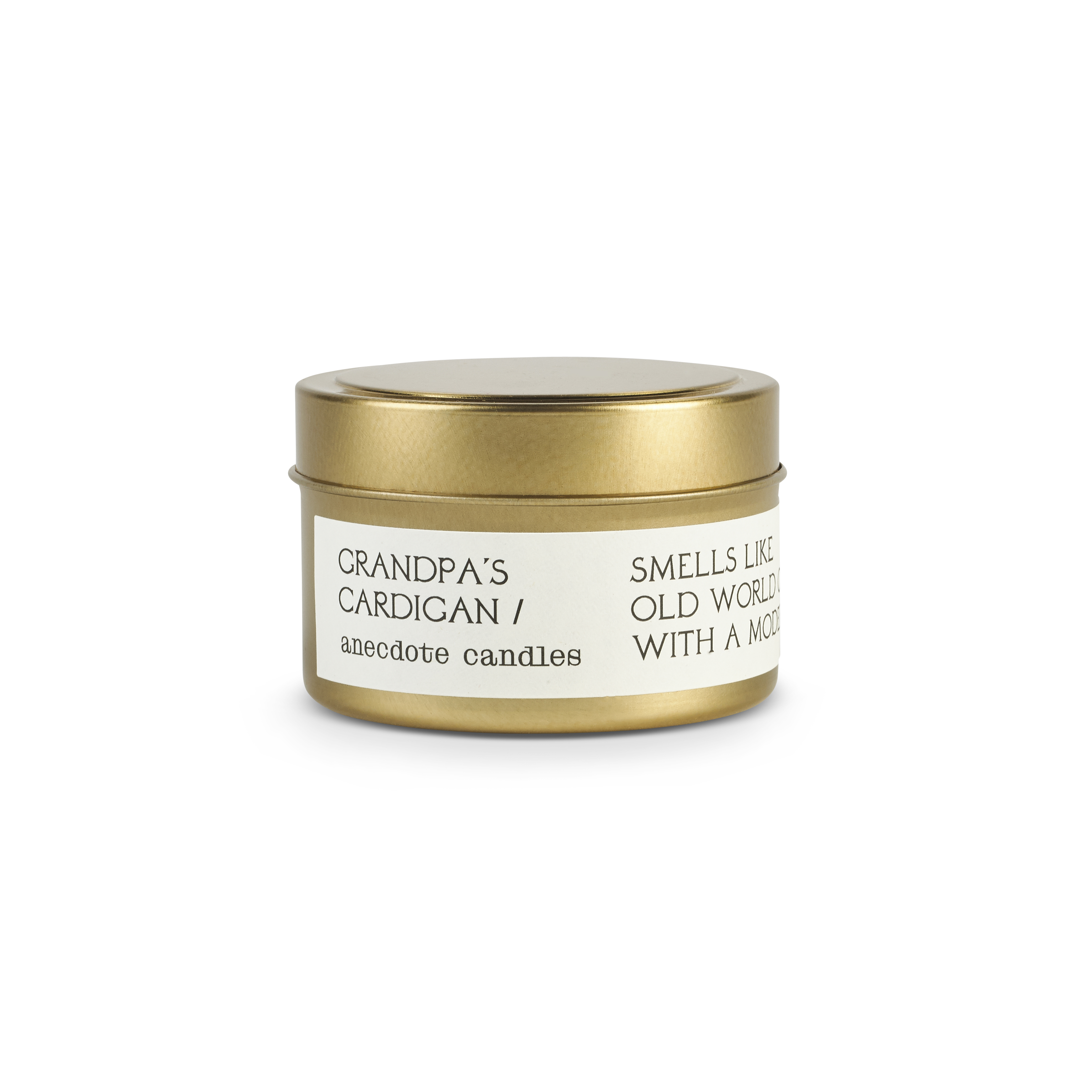 Candle tin labeled 'Grandpa's Cardigan' by anecdote candles on a white background