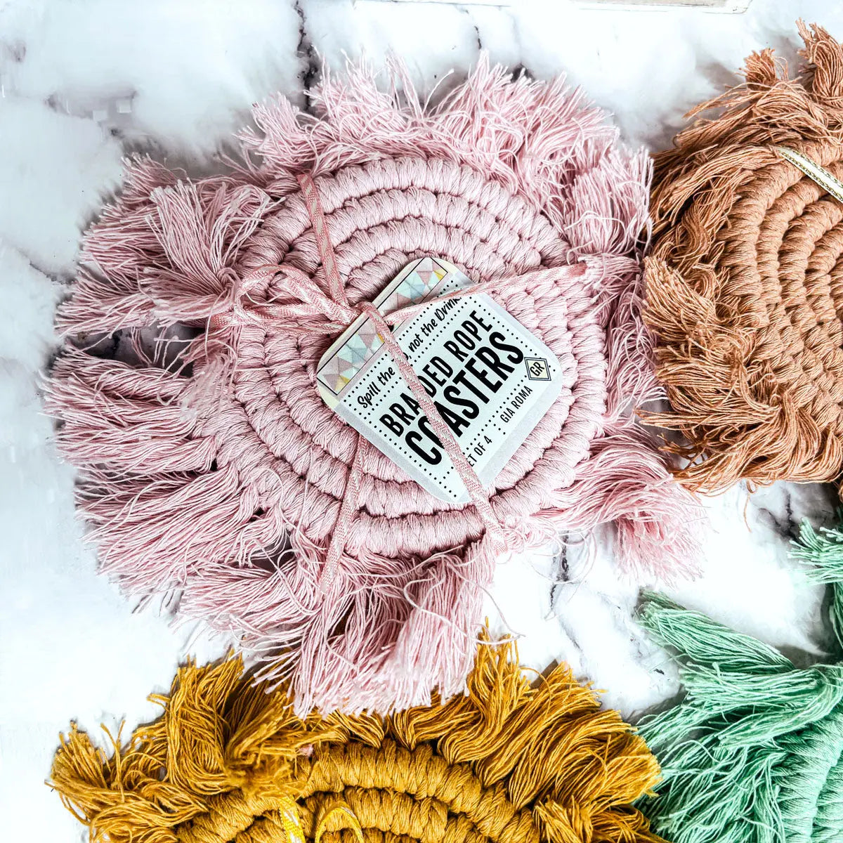 Pink yarn ball with a label on a white background