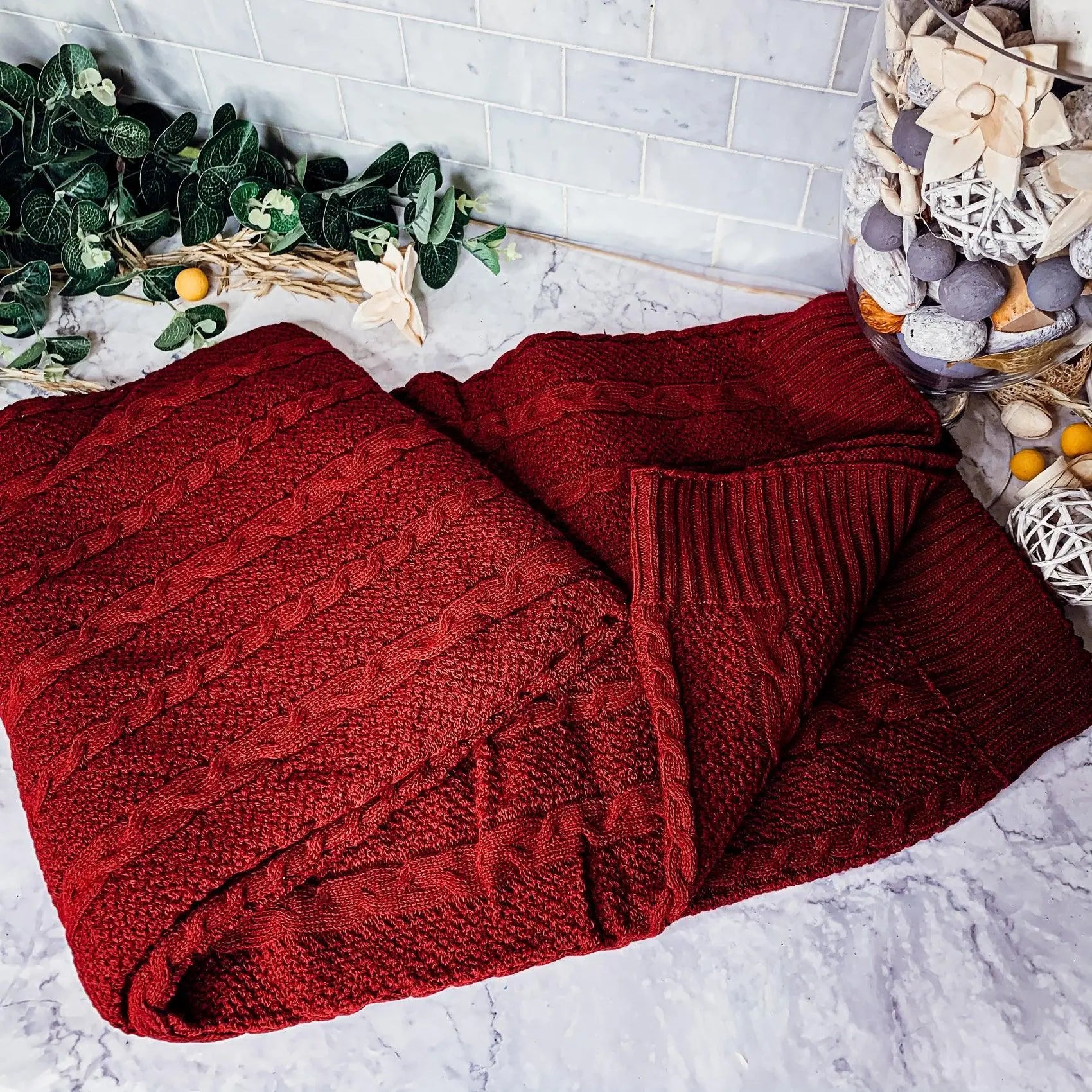 Cozy red cable knit blanket for farmhouse cottage style home decor