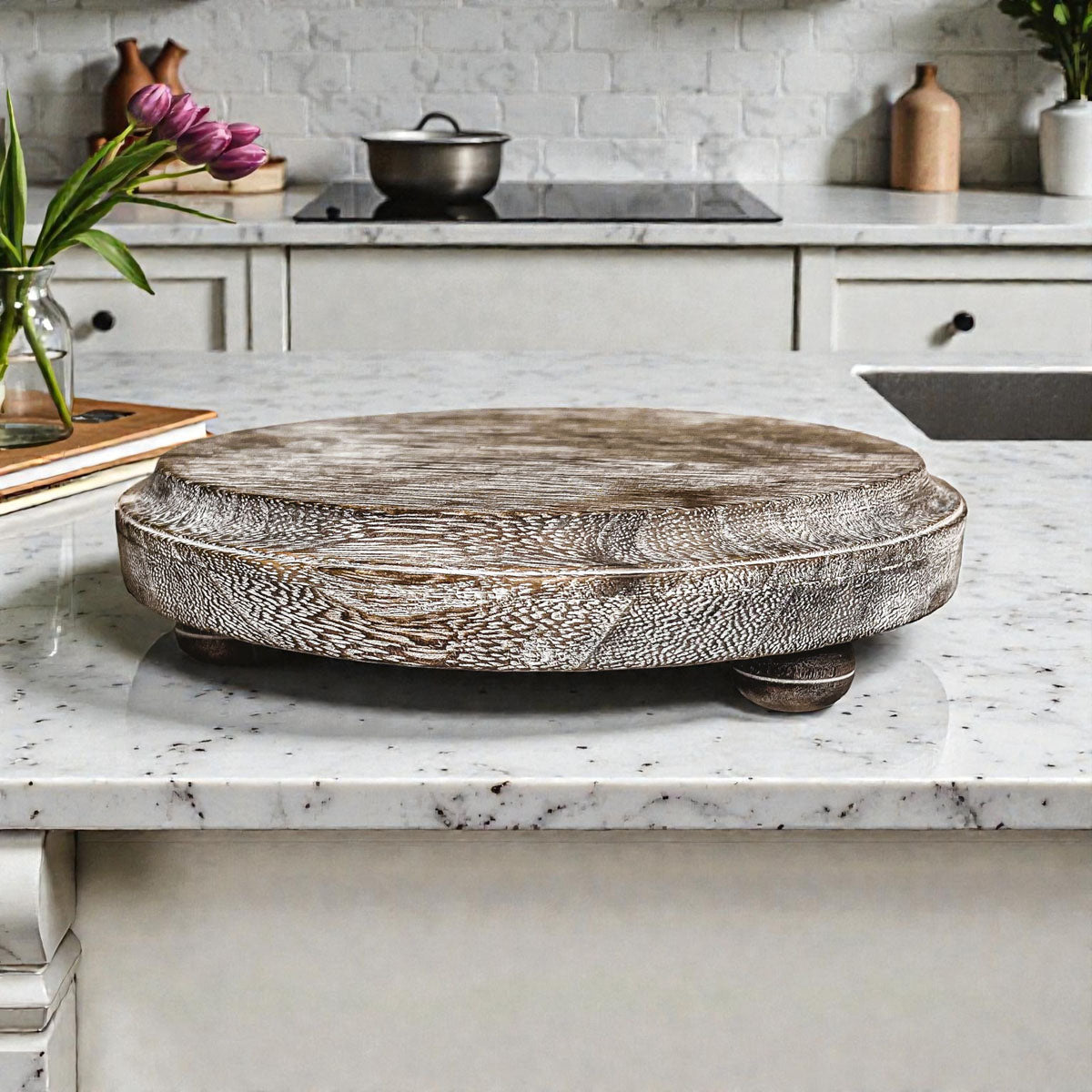 Decorative wooden turntable on a kitchen counter with a neutral color palette.
